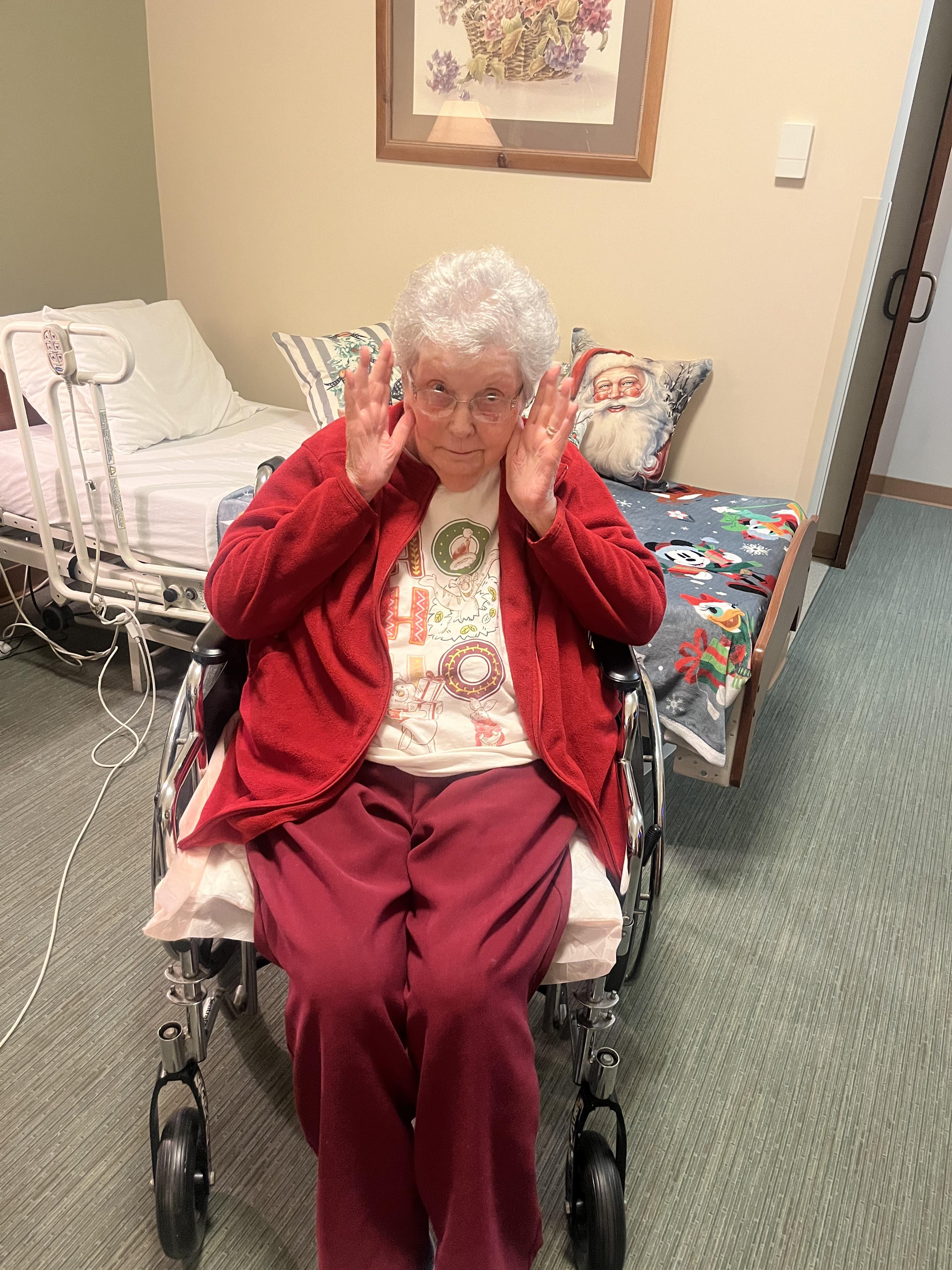 An old woman in a wheelchair