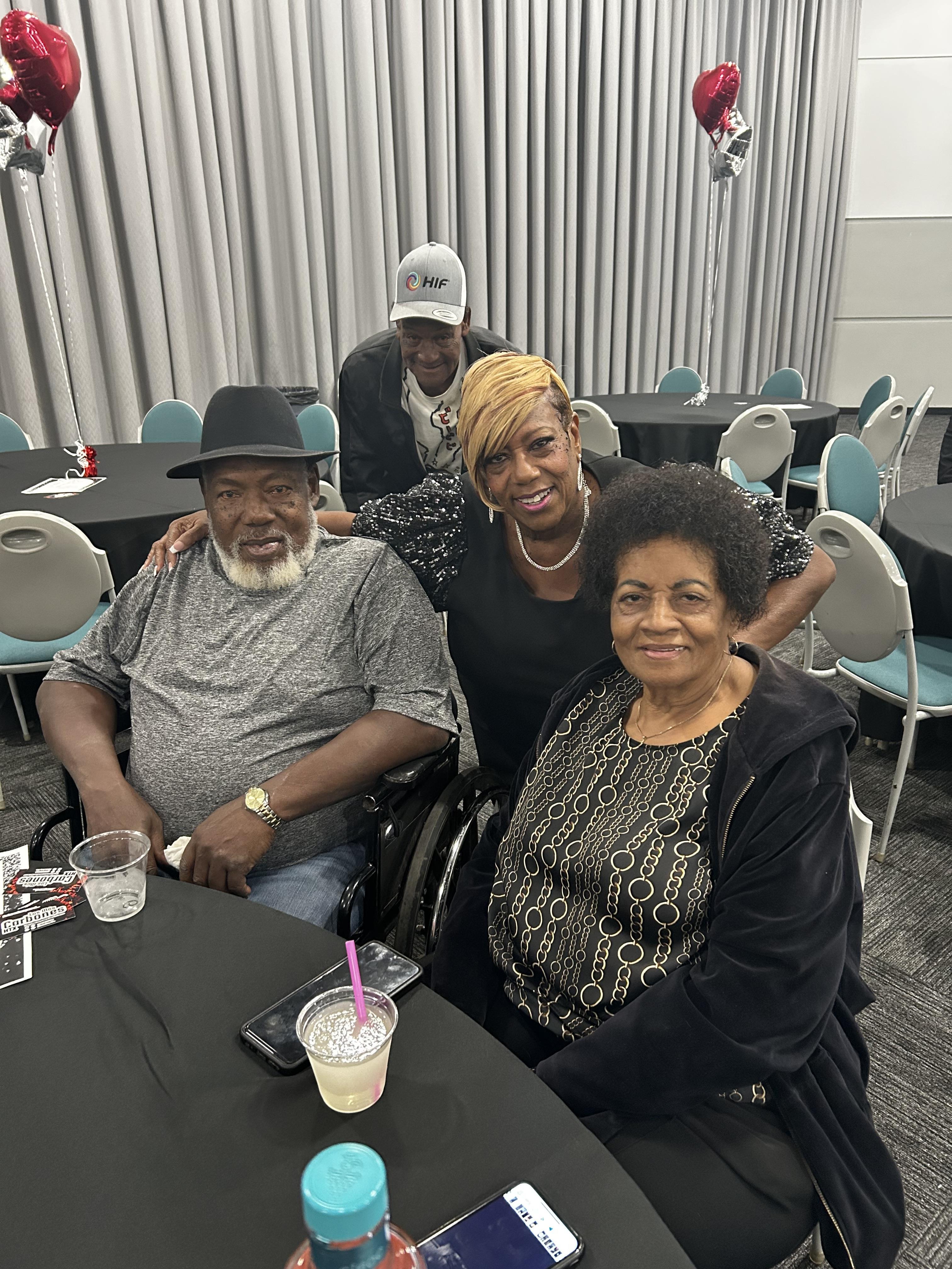 A group of people sitting at a table