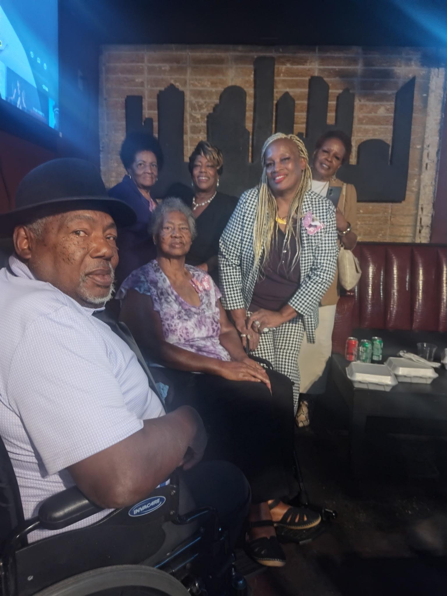 A group of people posing for a photo