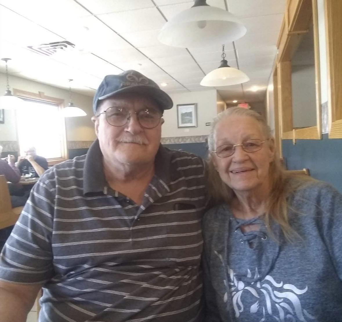 A man and woman sitting together