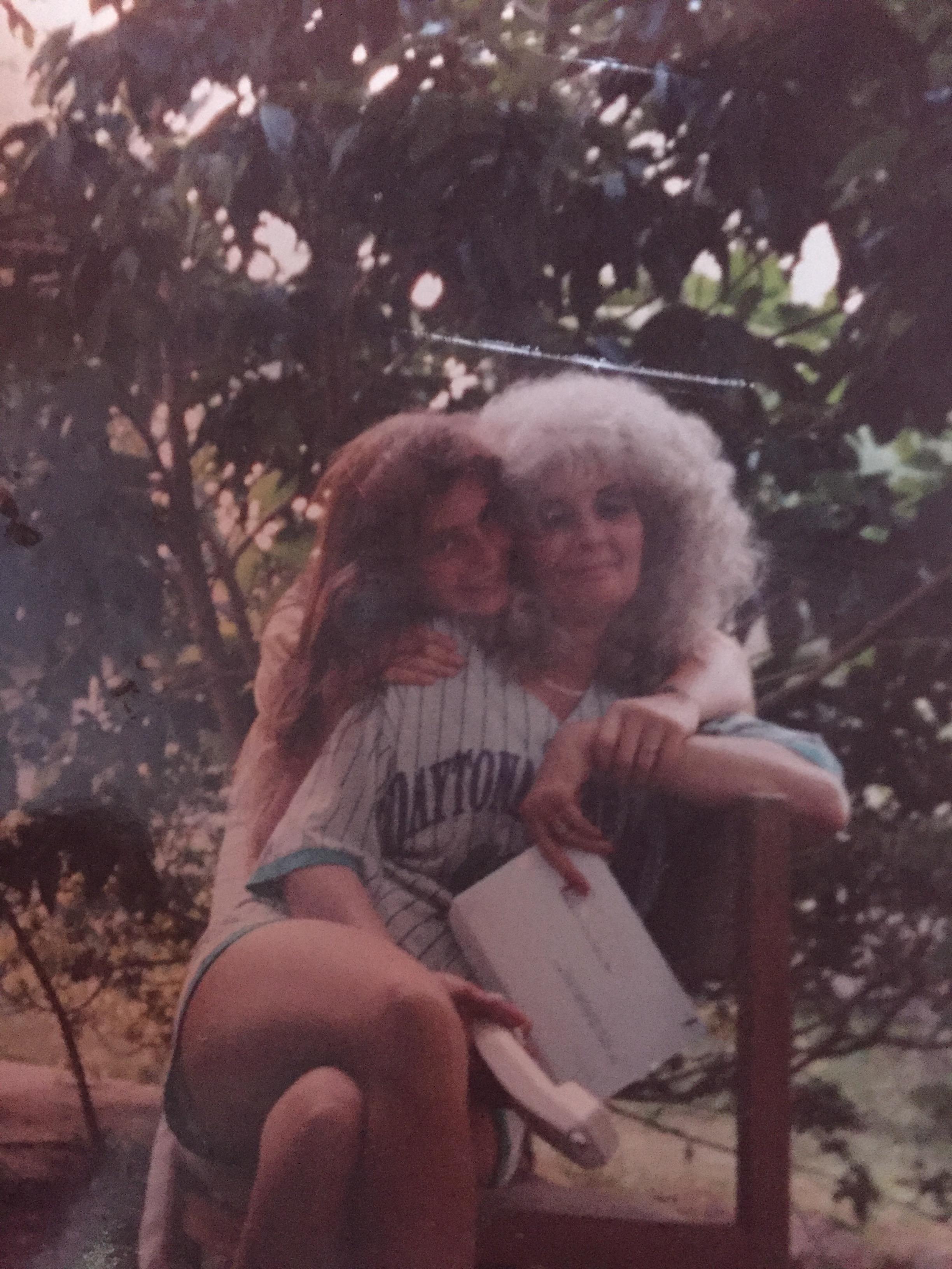 Two women sitting on a bench