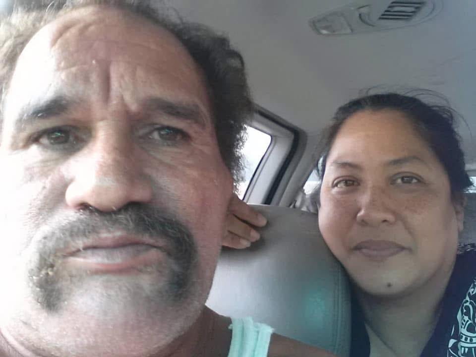A man and woman taking a selfie