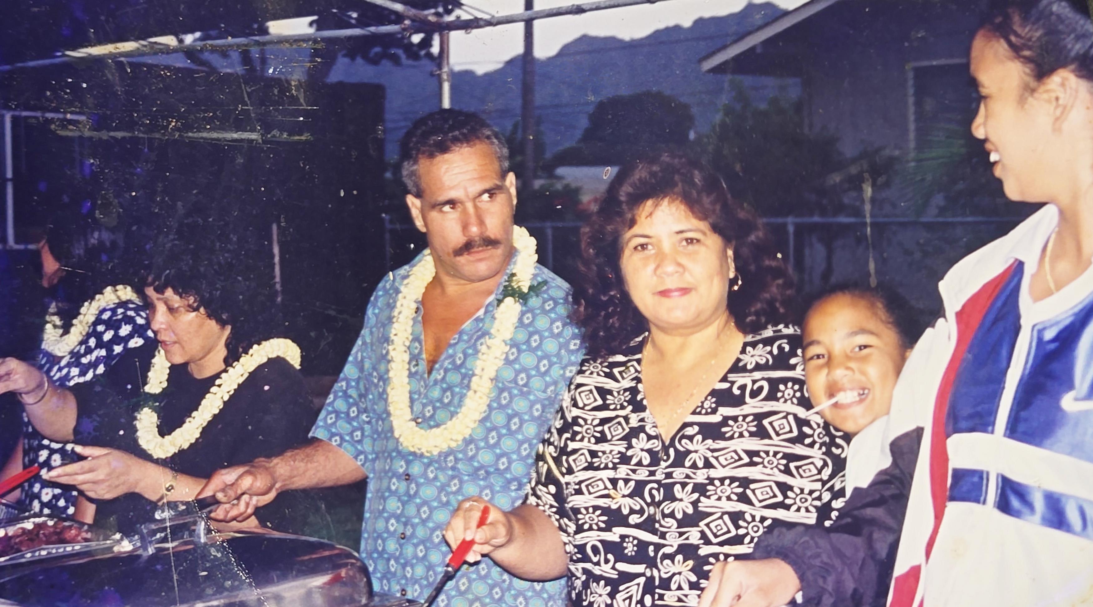 A man and woman standing next to each other