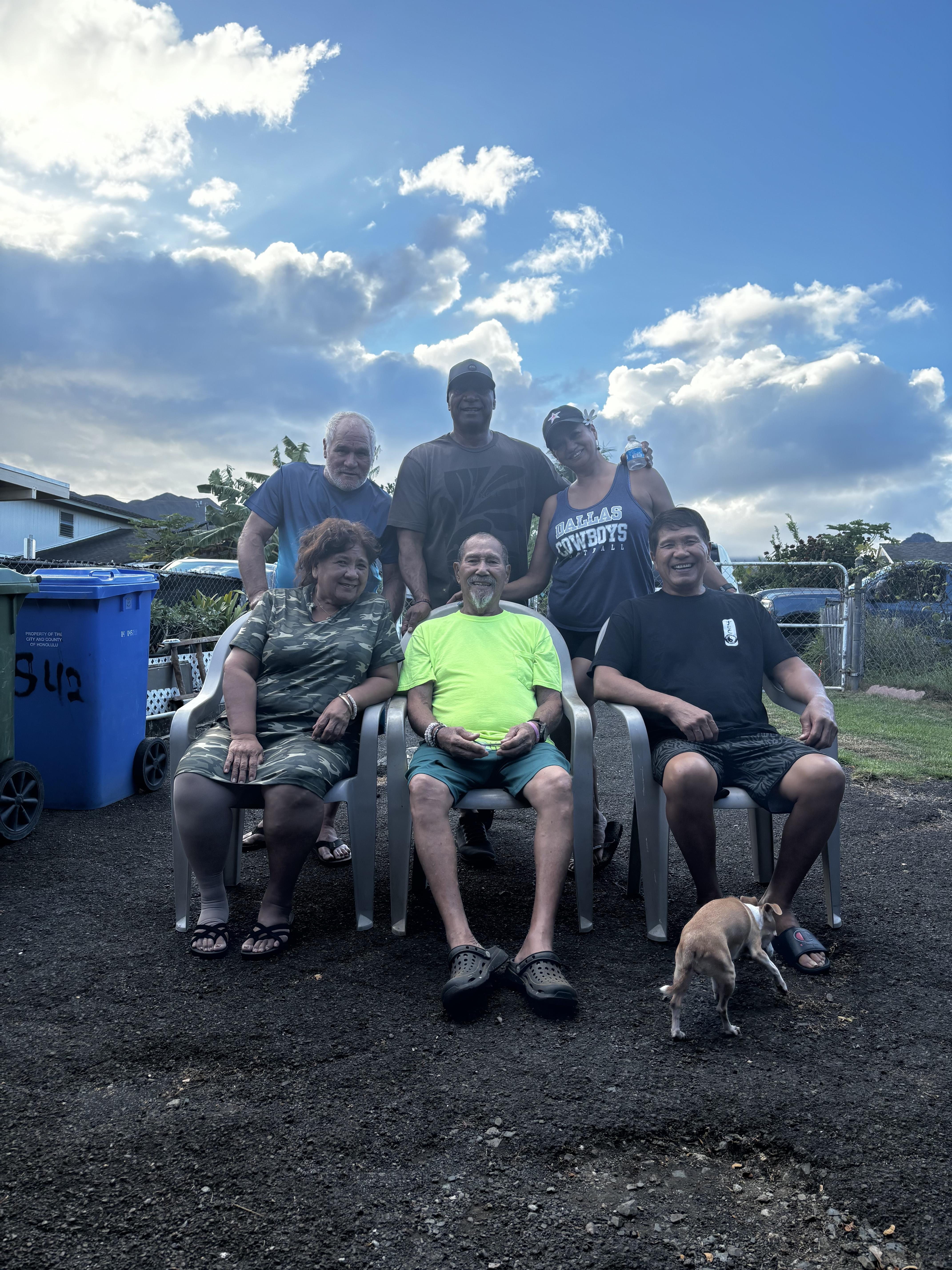 A group of people sitting in chairs