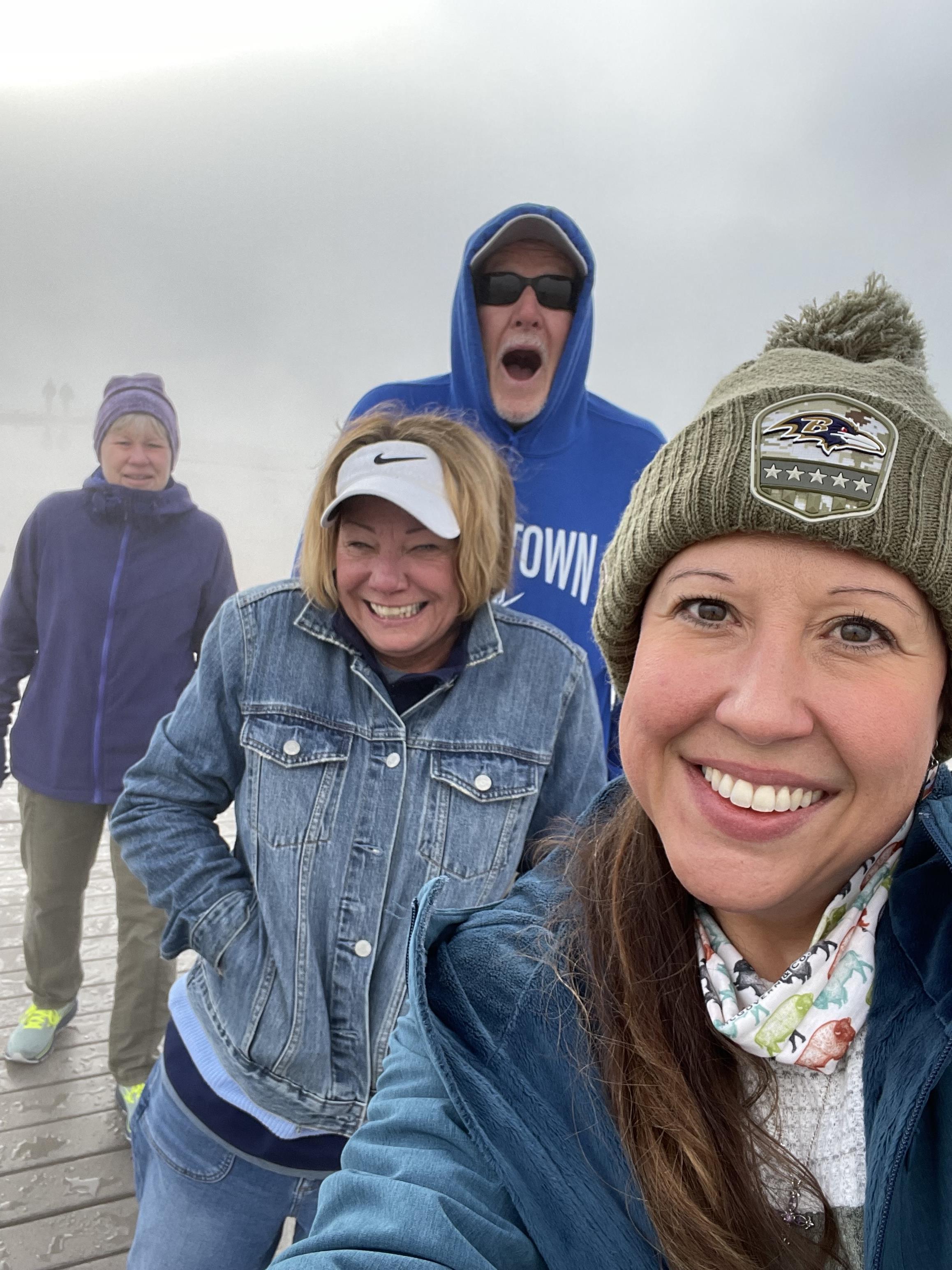 A group of people posing for a selfie