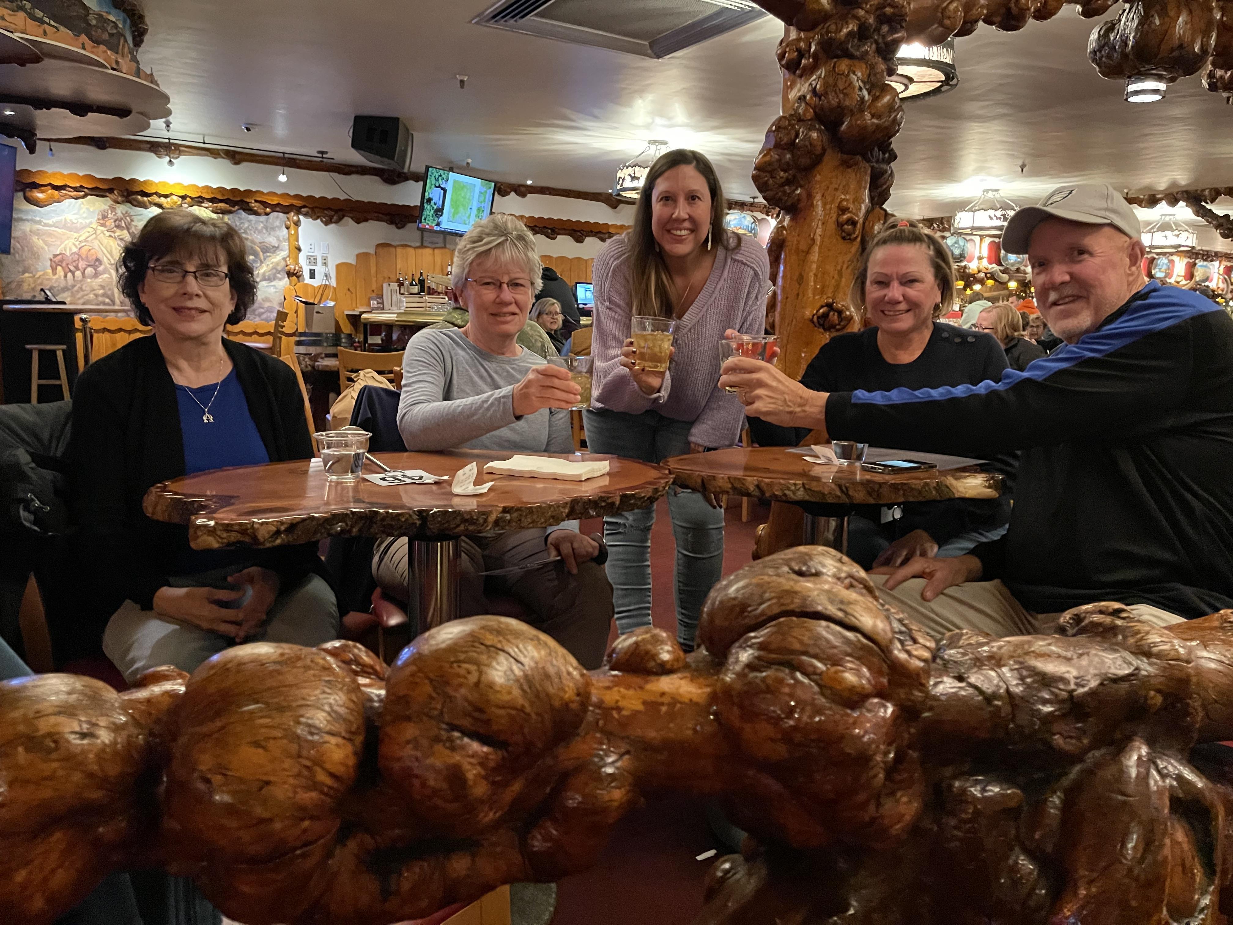 A group of people sitting at a table