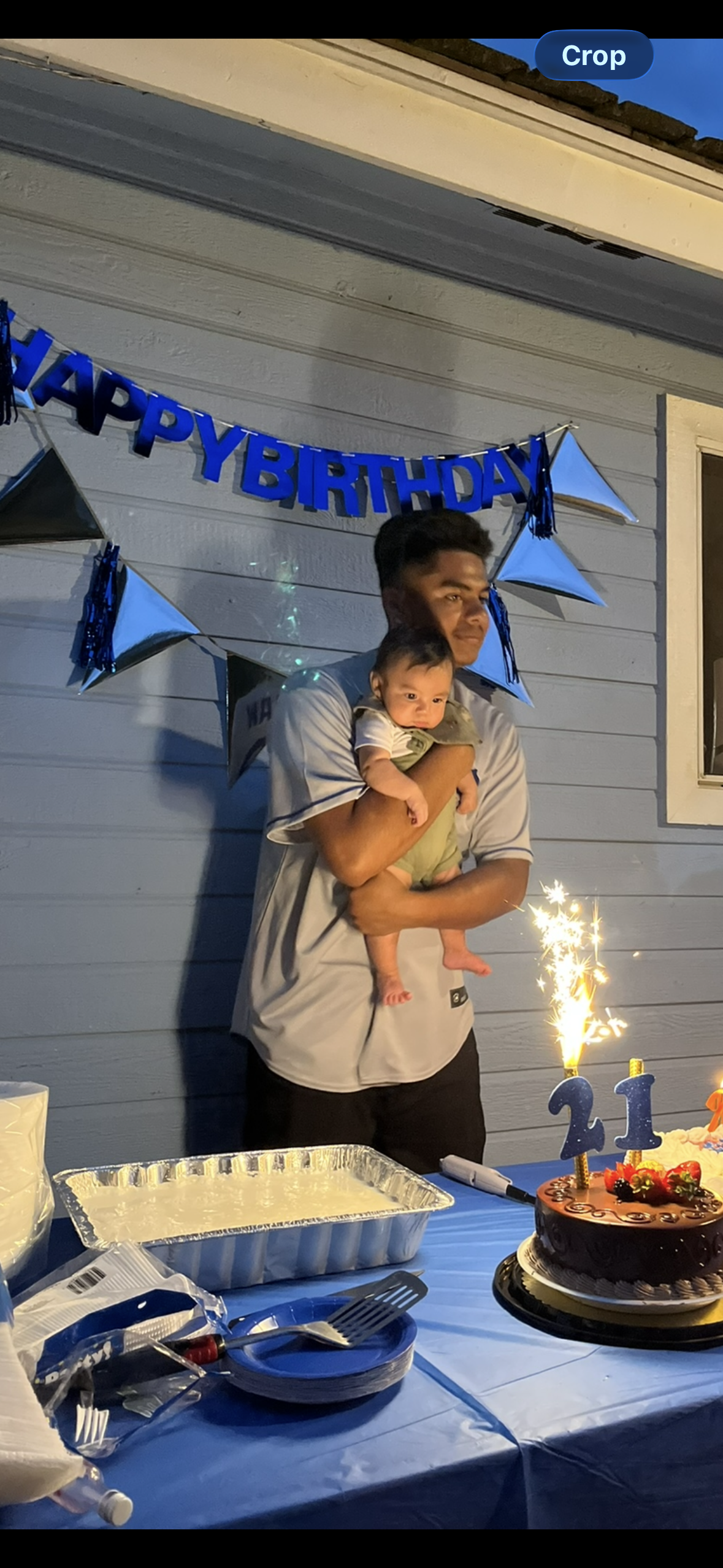 A man holding a baby