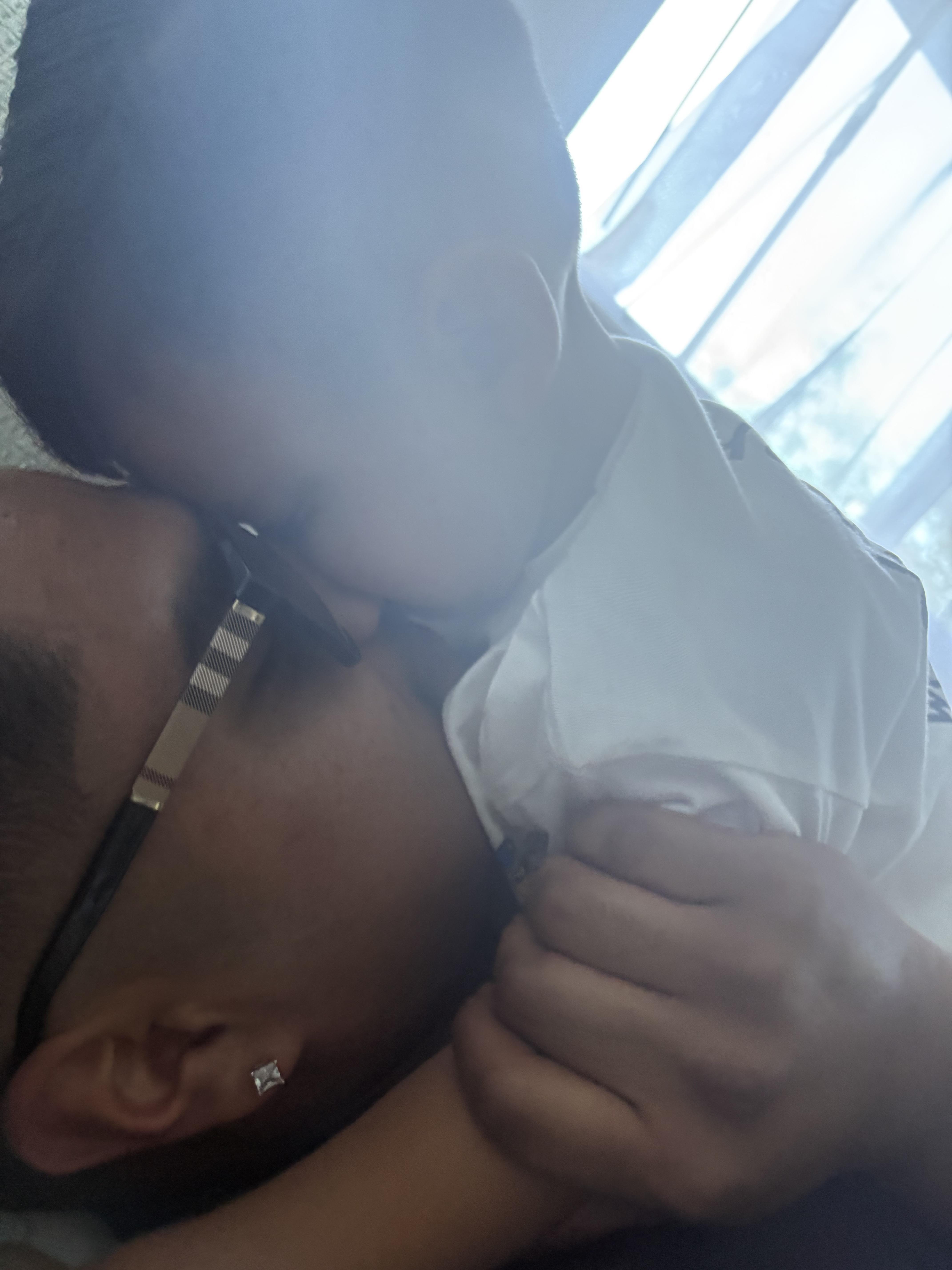 A man kissing a baby