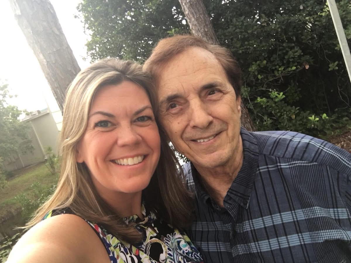 A man and woman taking a selfie