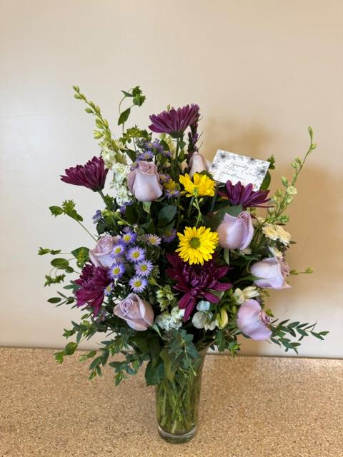 A bouquet of flowers in a vase