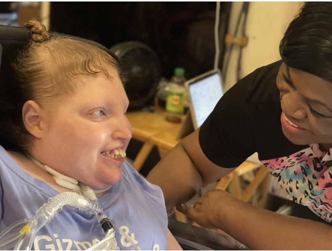 A woman smiling at a man