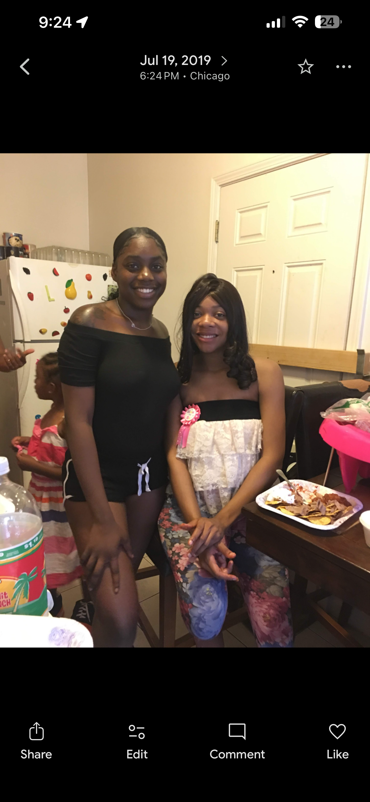 Two women standing next to each other