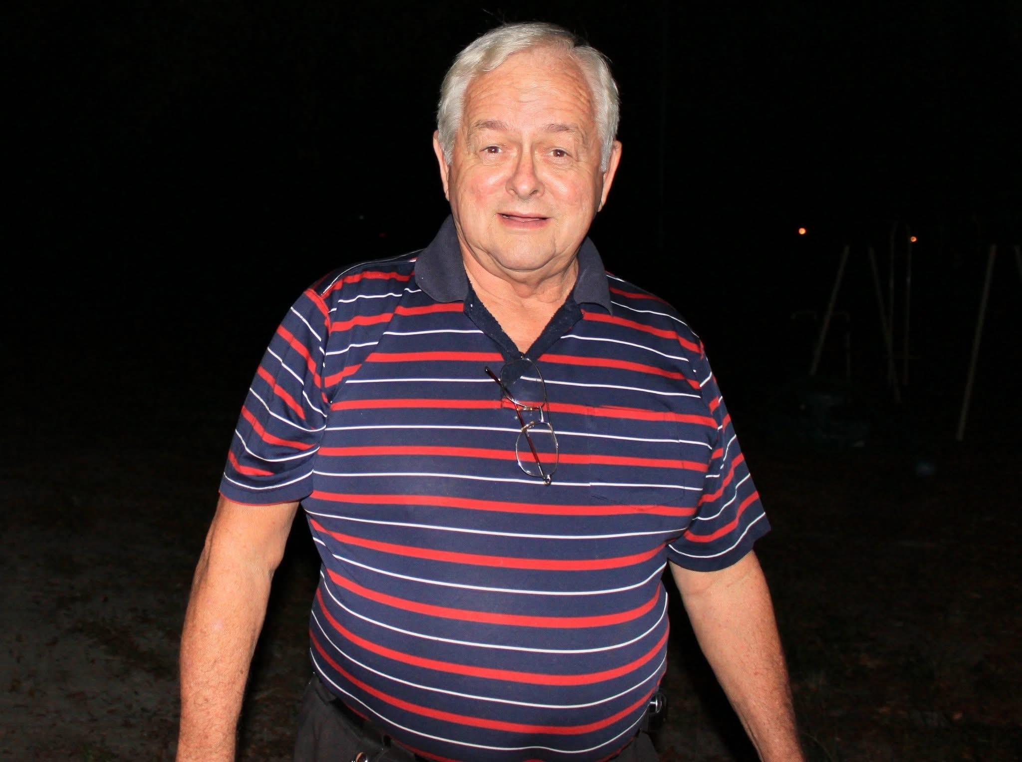 A man in a striped shirt