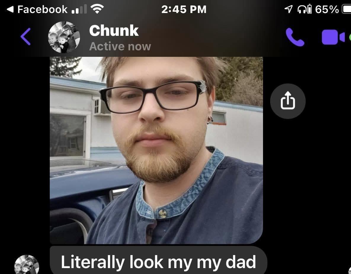 A man with glasses and beard