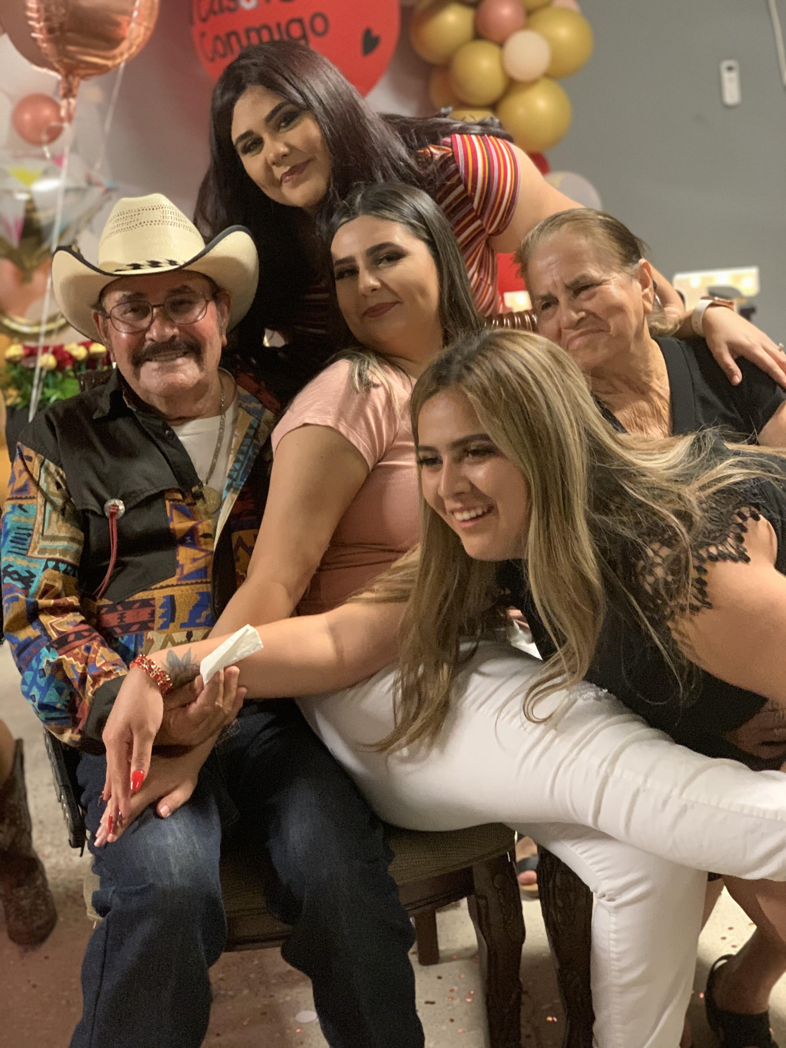 A group of people posing for a photo