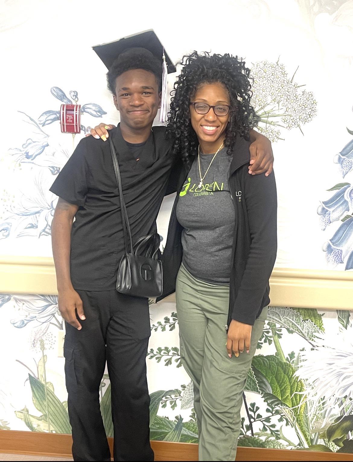 A man and woman posing for a picture