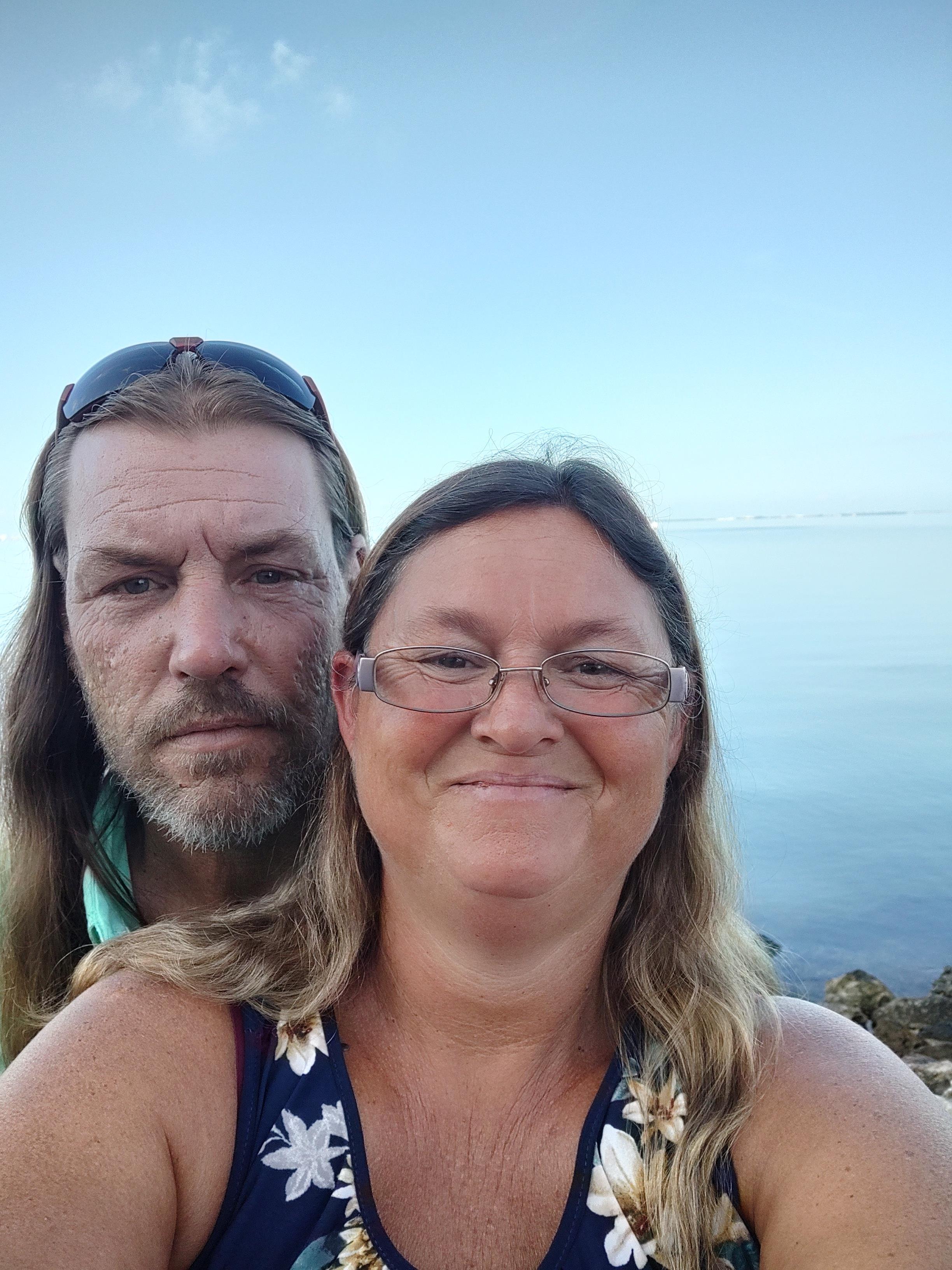 A man and woman taking a selfie