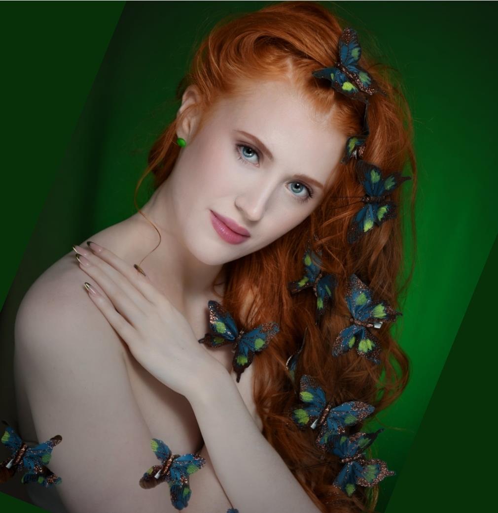 A woman with butterflies around her hair
