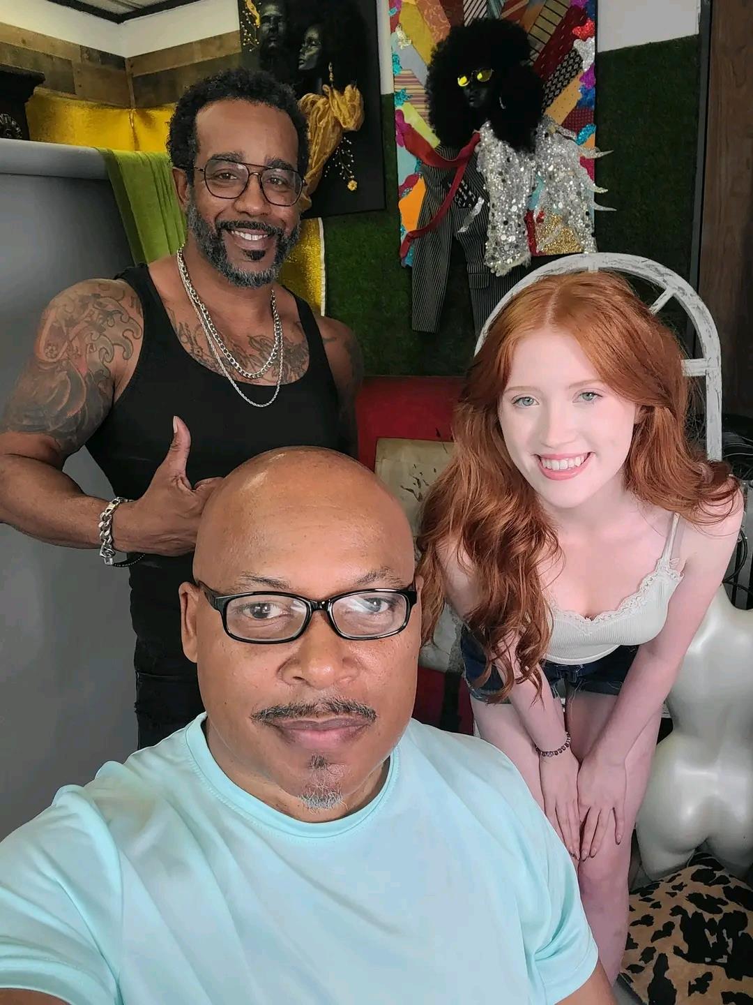 A group of people posing for a selfie