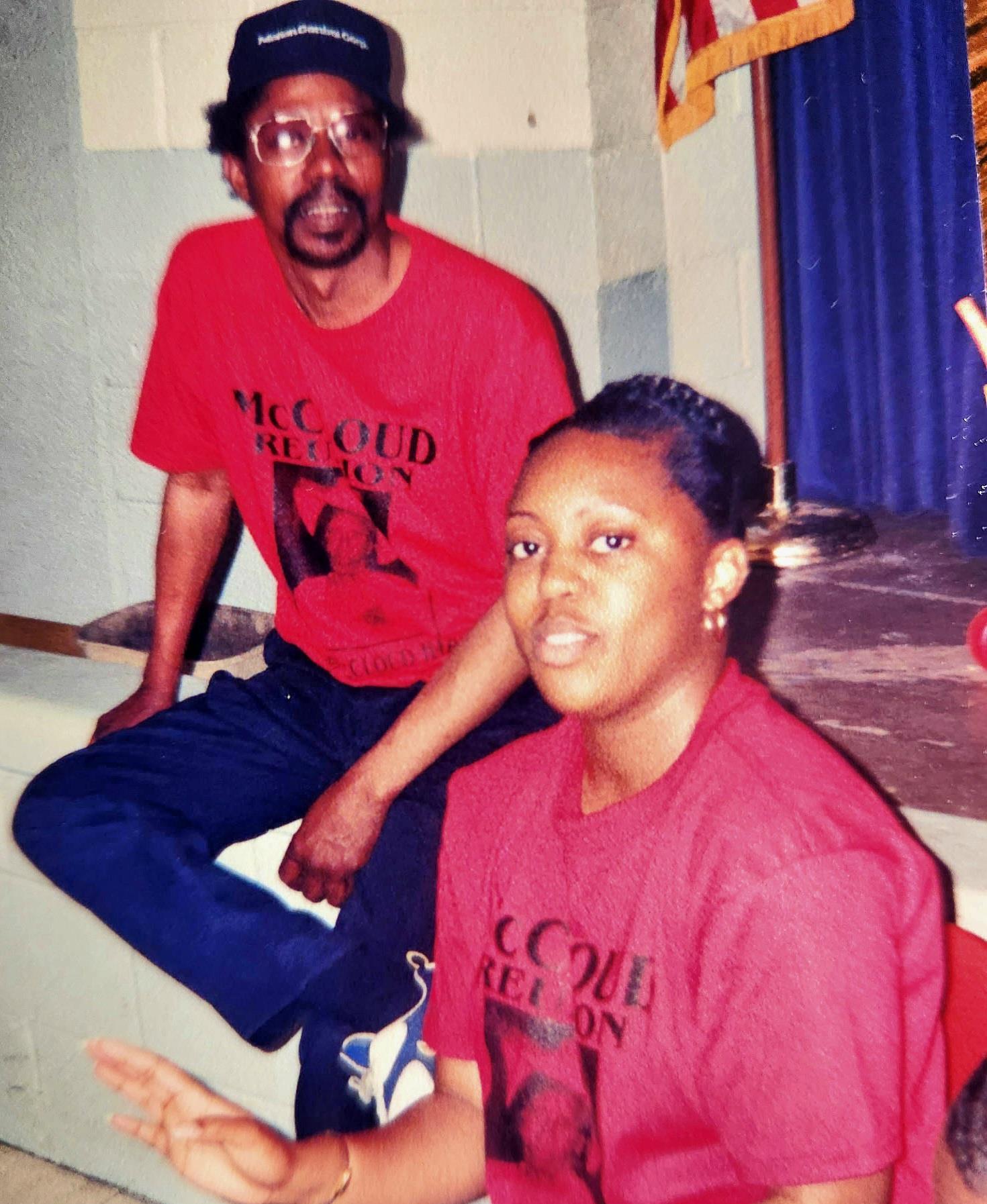 A man and woman in red shirts
