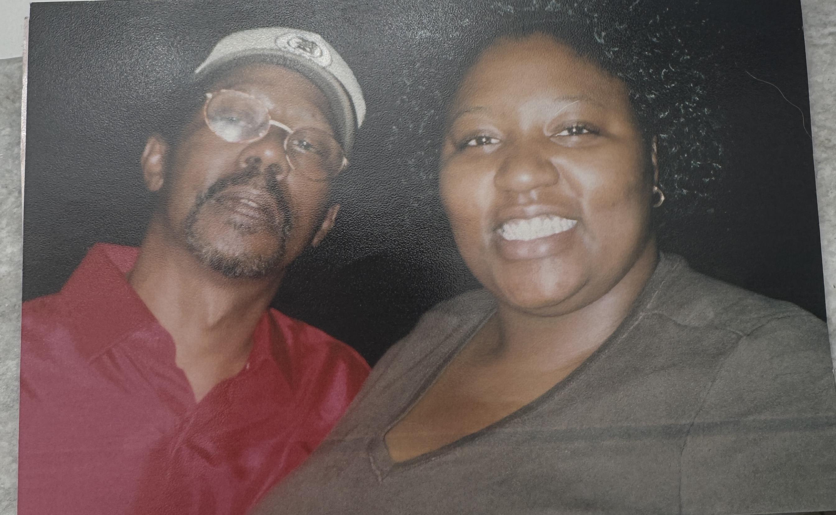 A man and woman smiling for a picture