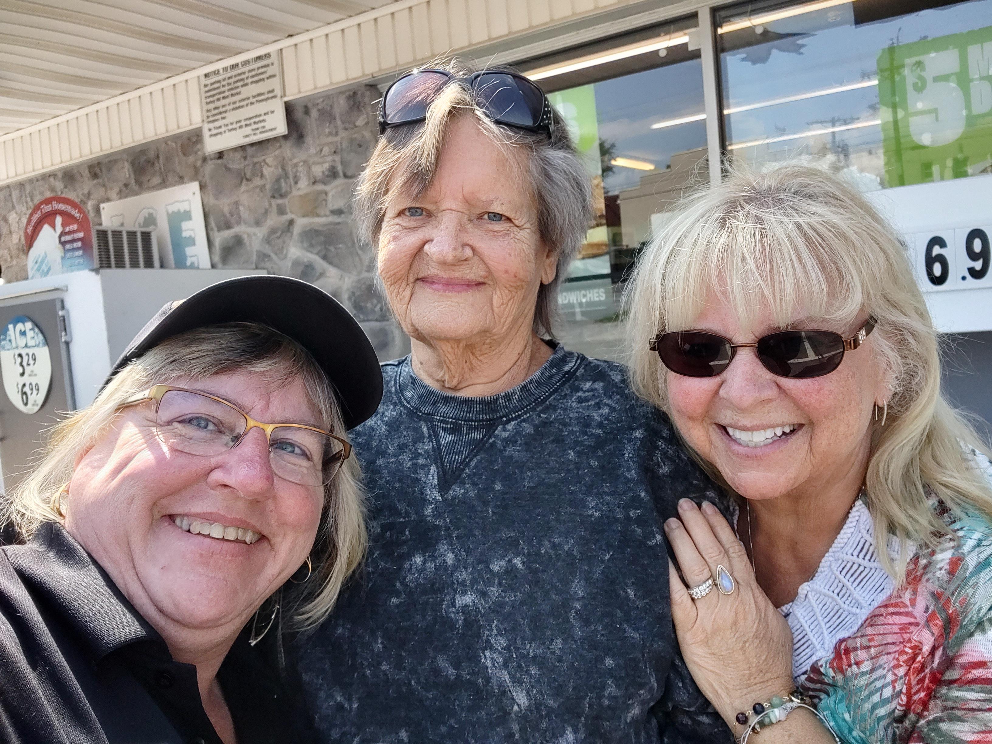 A group of women posing for a photo