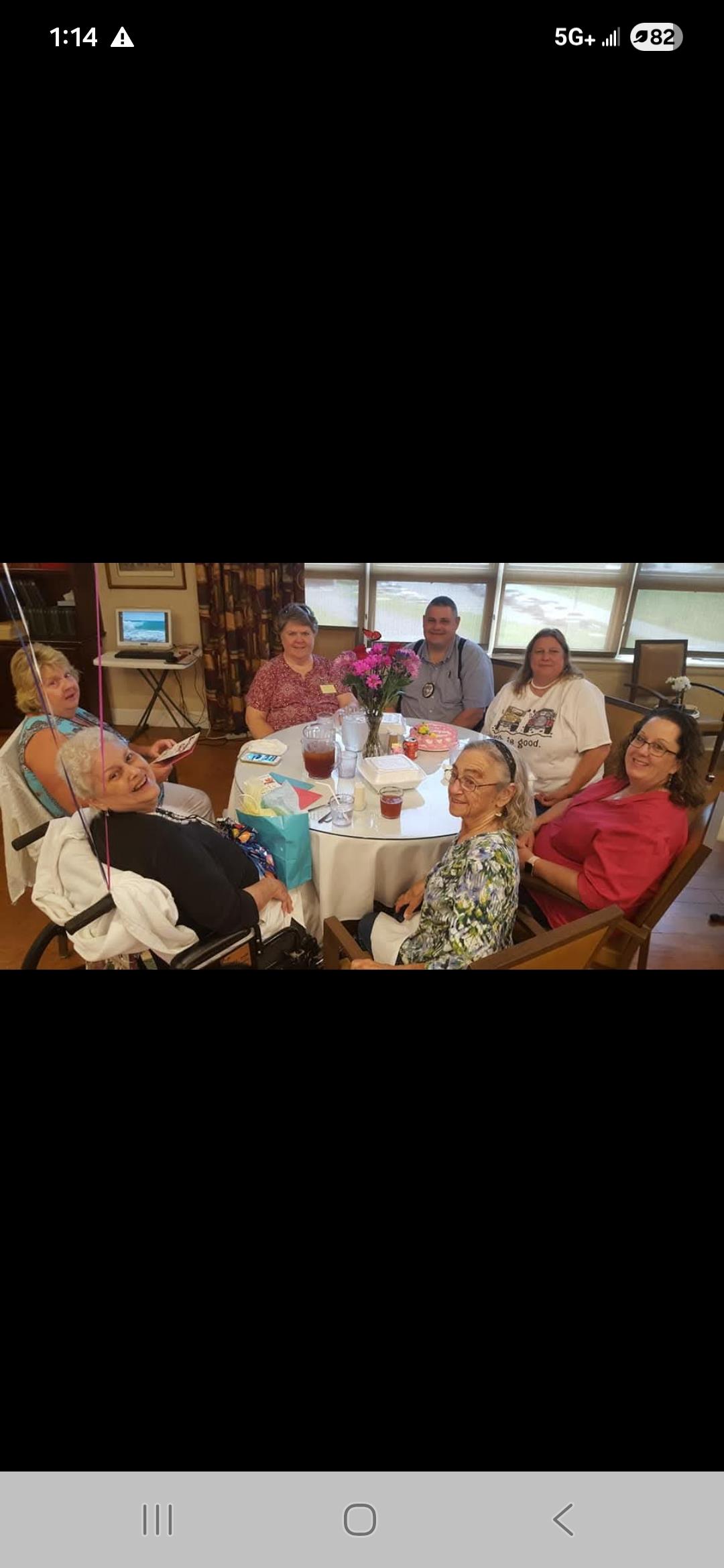 A group of people around a table