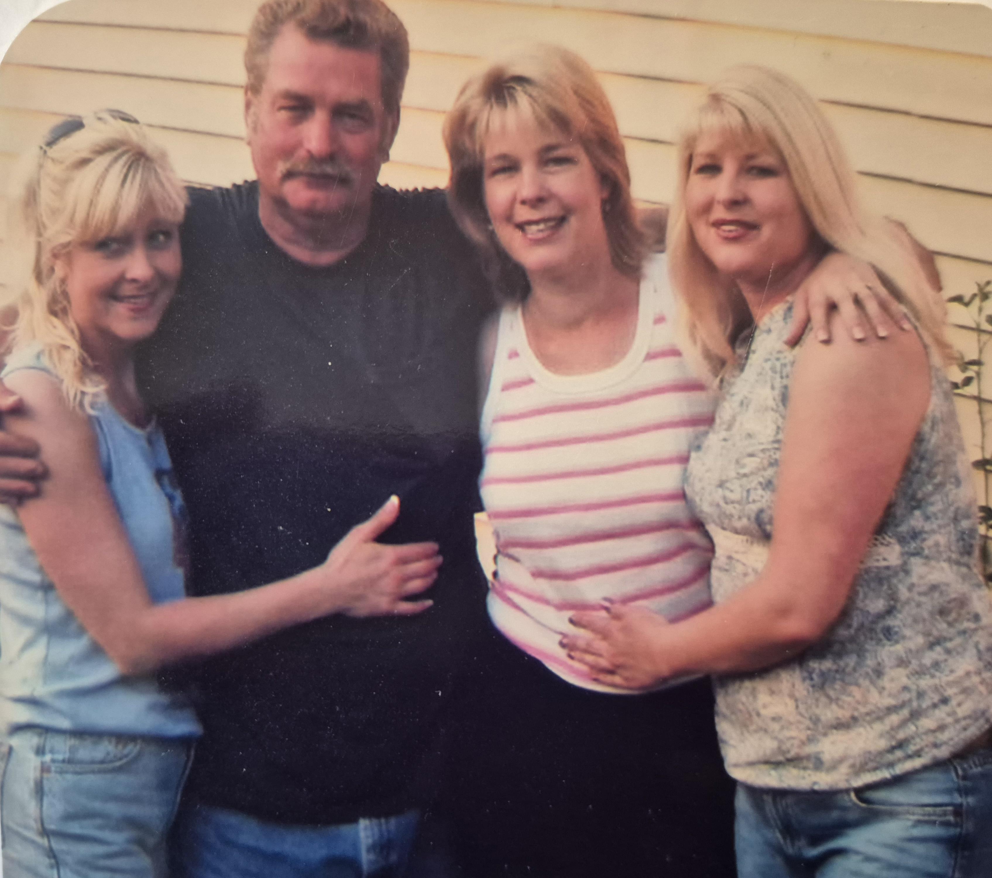 A group of people posing for a photo