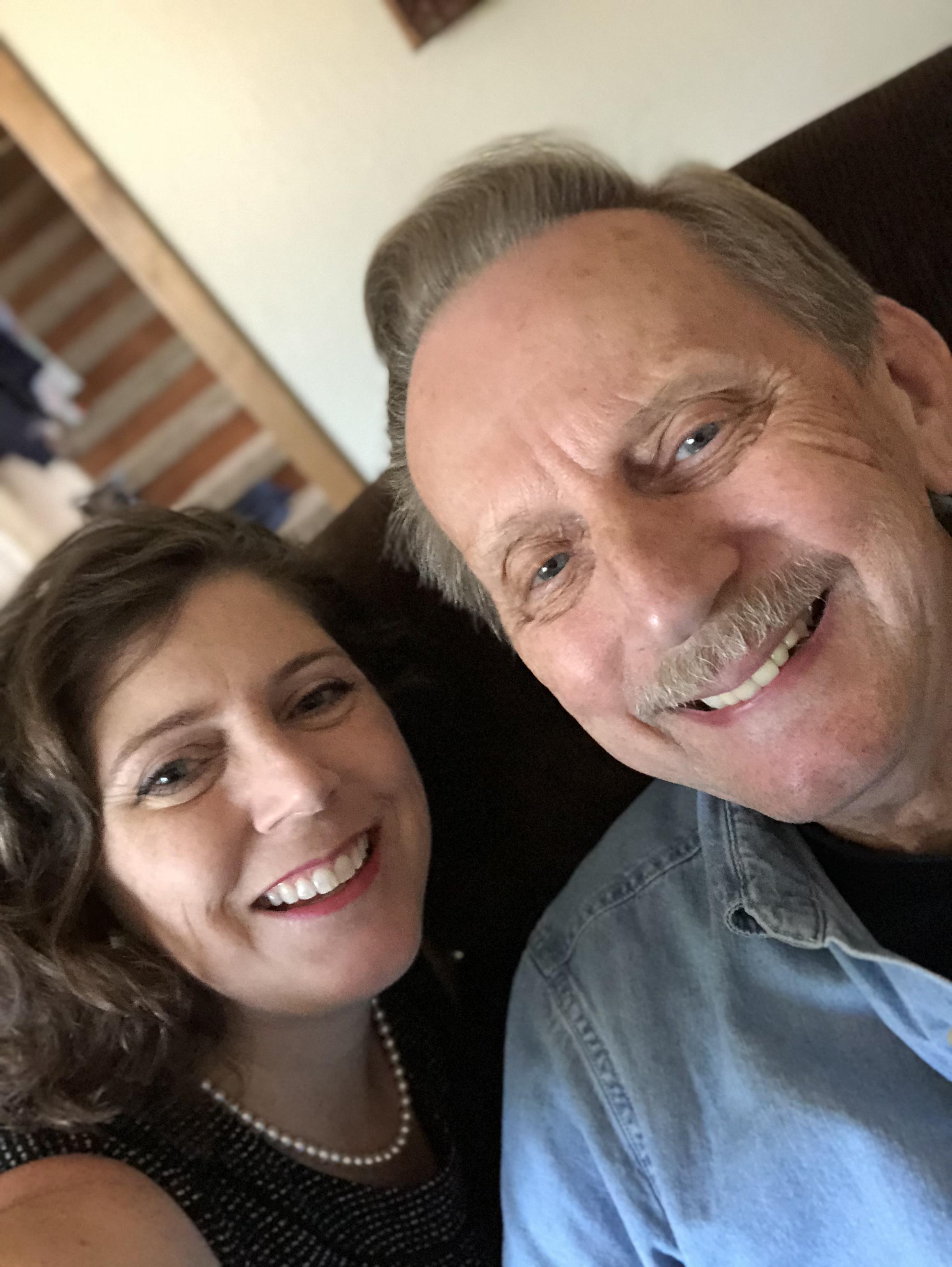 A man and woman taking a selfie