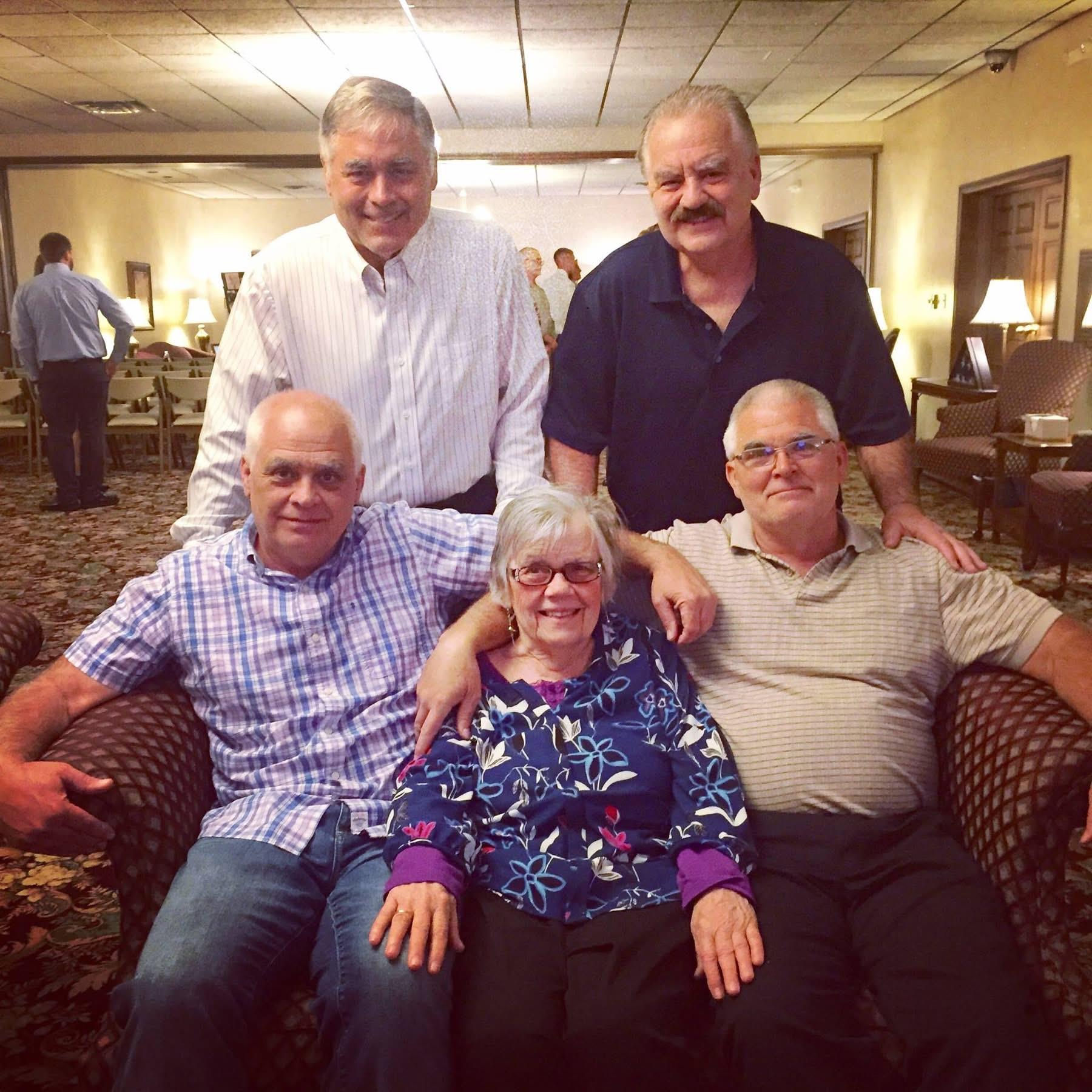 A group of people sitting on a couch