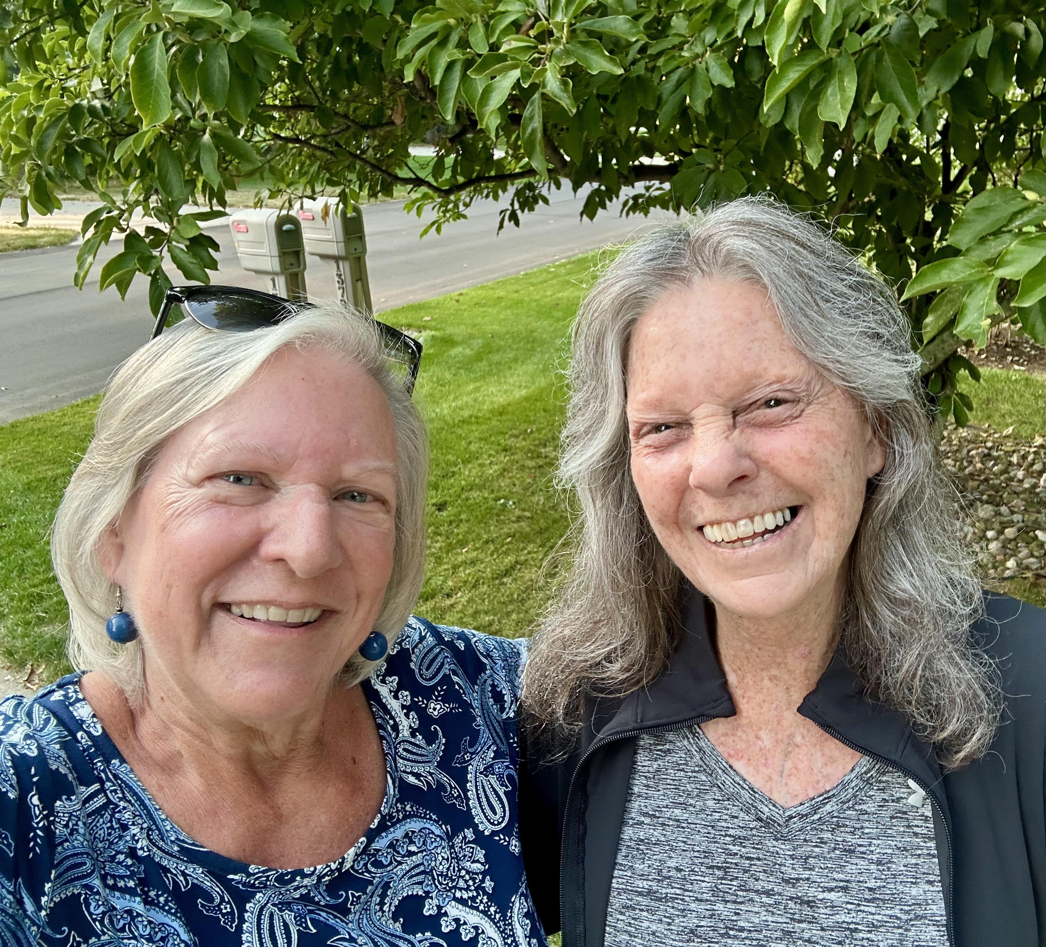 Two women smiling at the camera