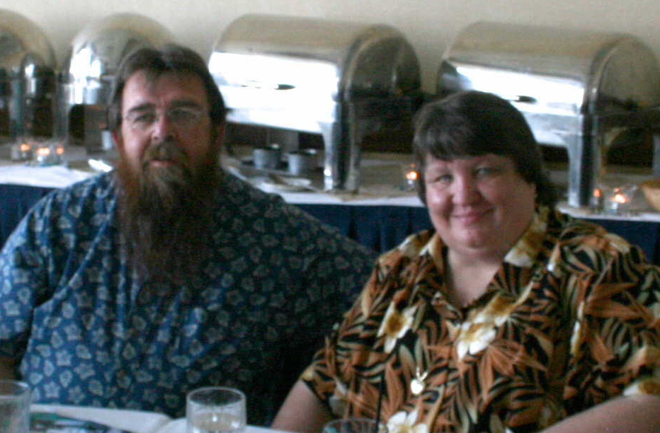A man and woman sitting at a table