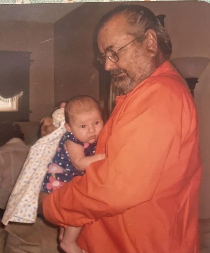 A man holding a baby