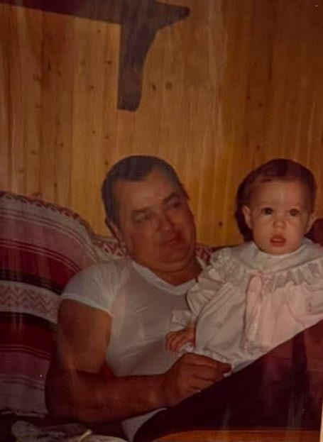 A man holding a baby