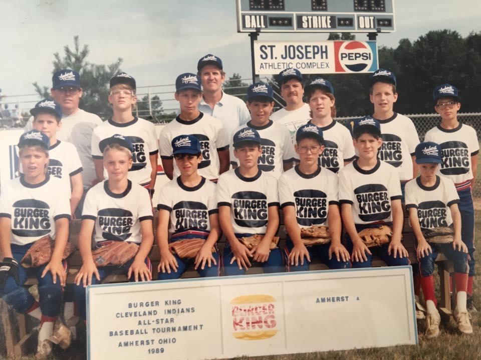 A group of young boys in baseball uniforms