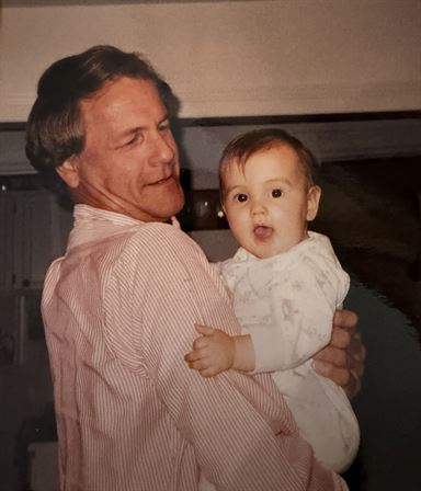 A man holding a baby