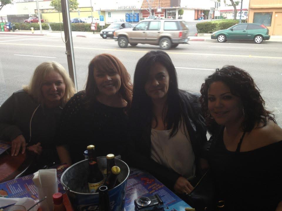 A group of women sitting at a table