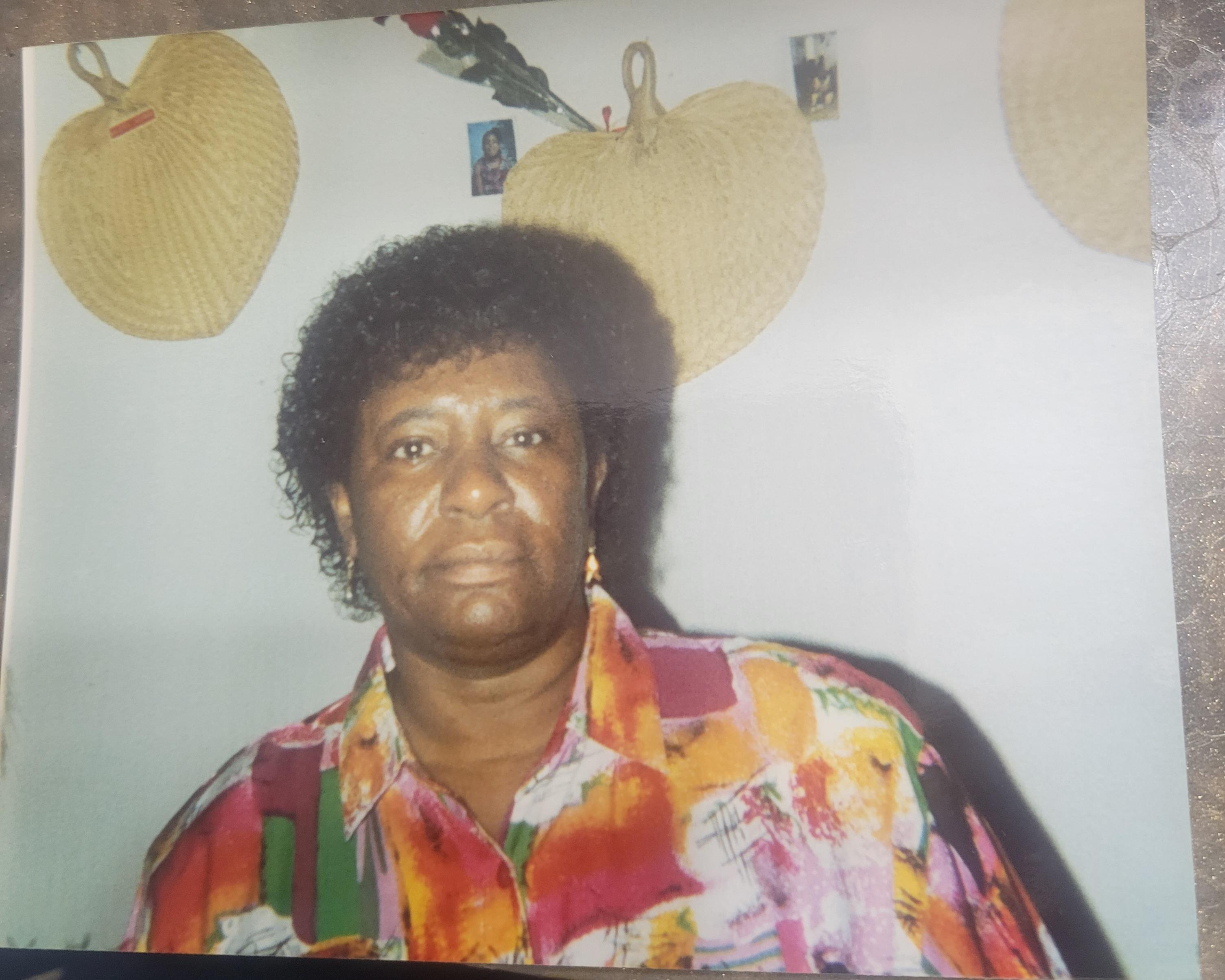 A woman in a colorful shirt