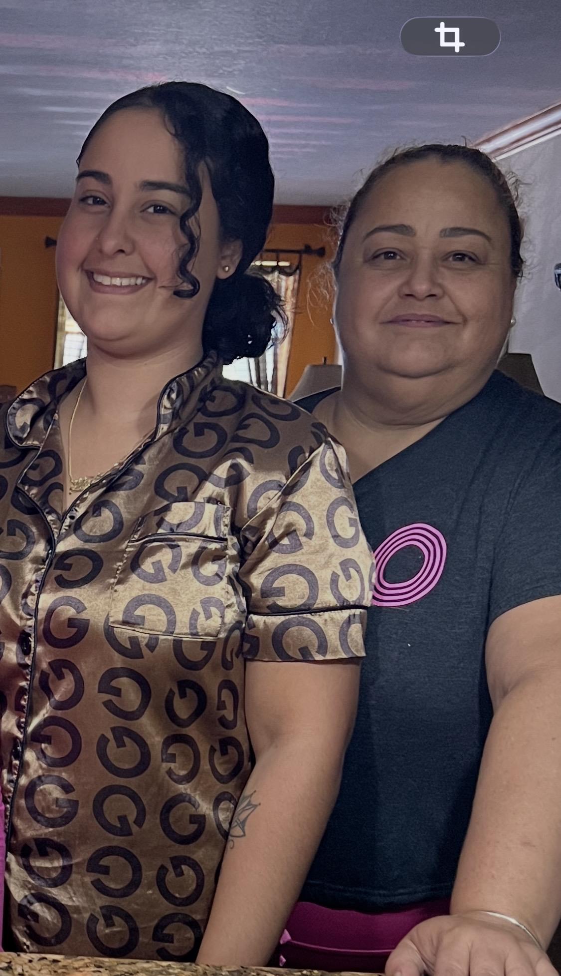 Two women smiling at the camera