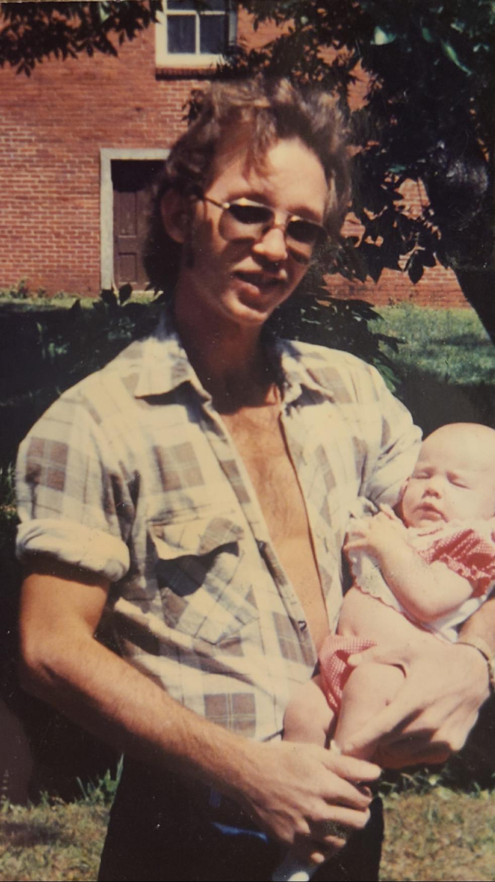 A man holding a baby