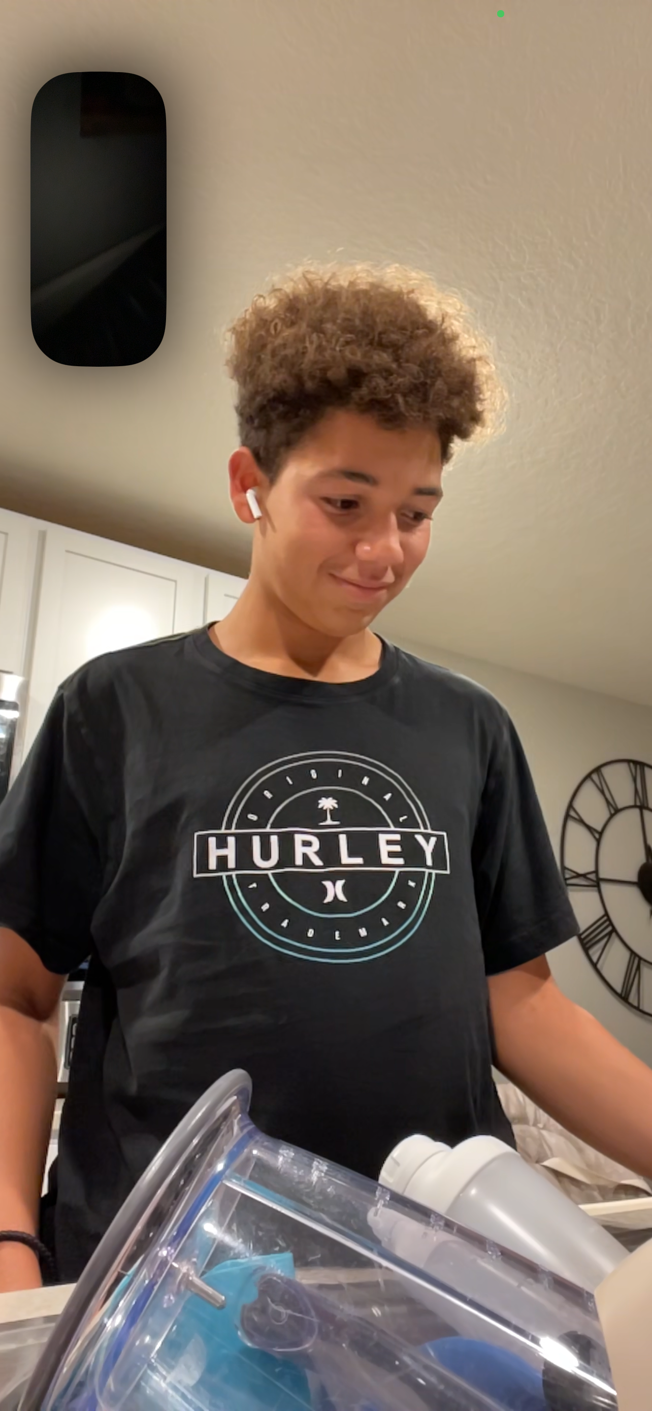A boy wearing a black shirt
