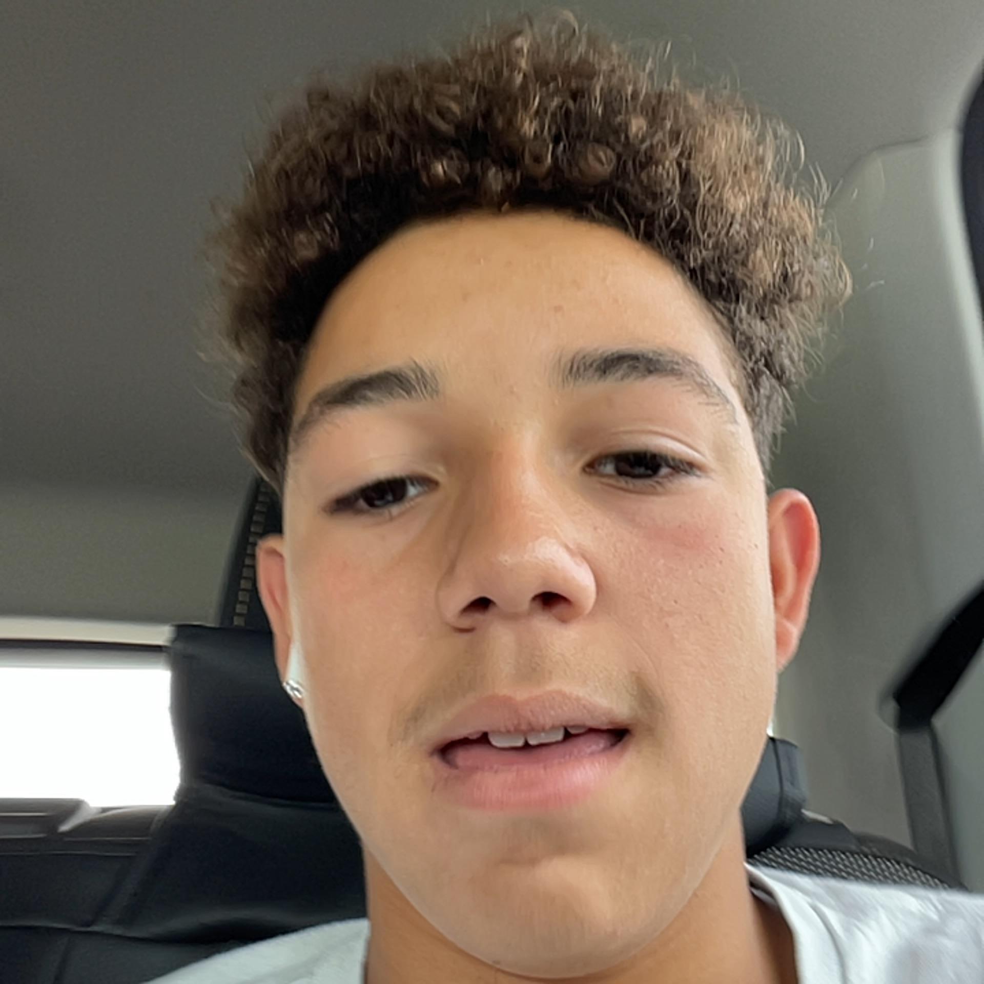 A boy taking a selfie