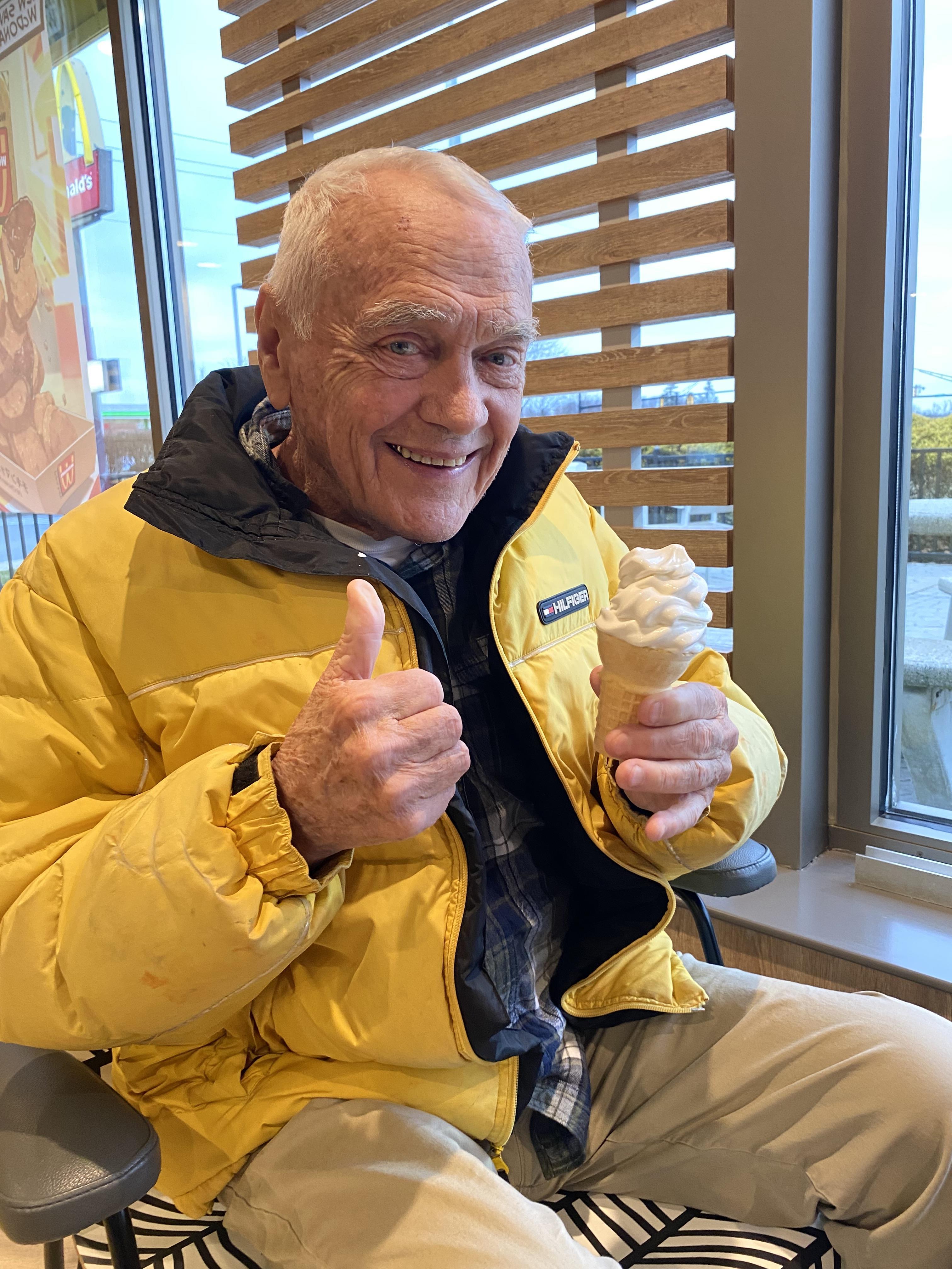 A man holding an ice cream cone