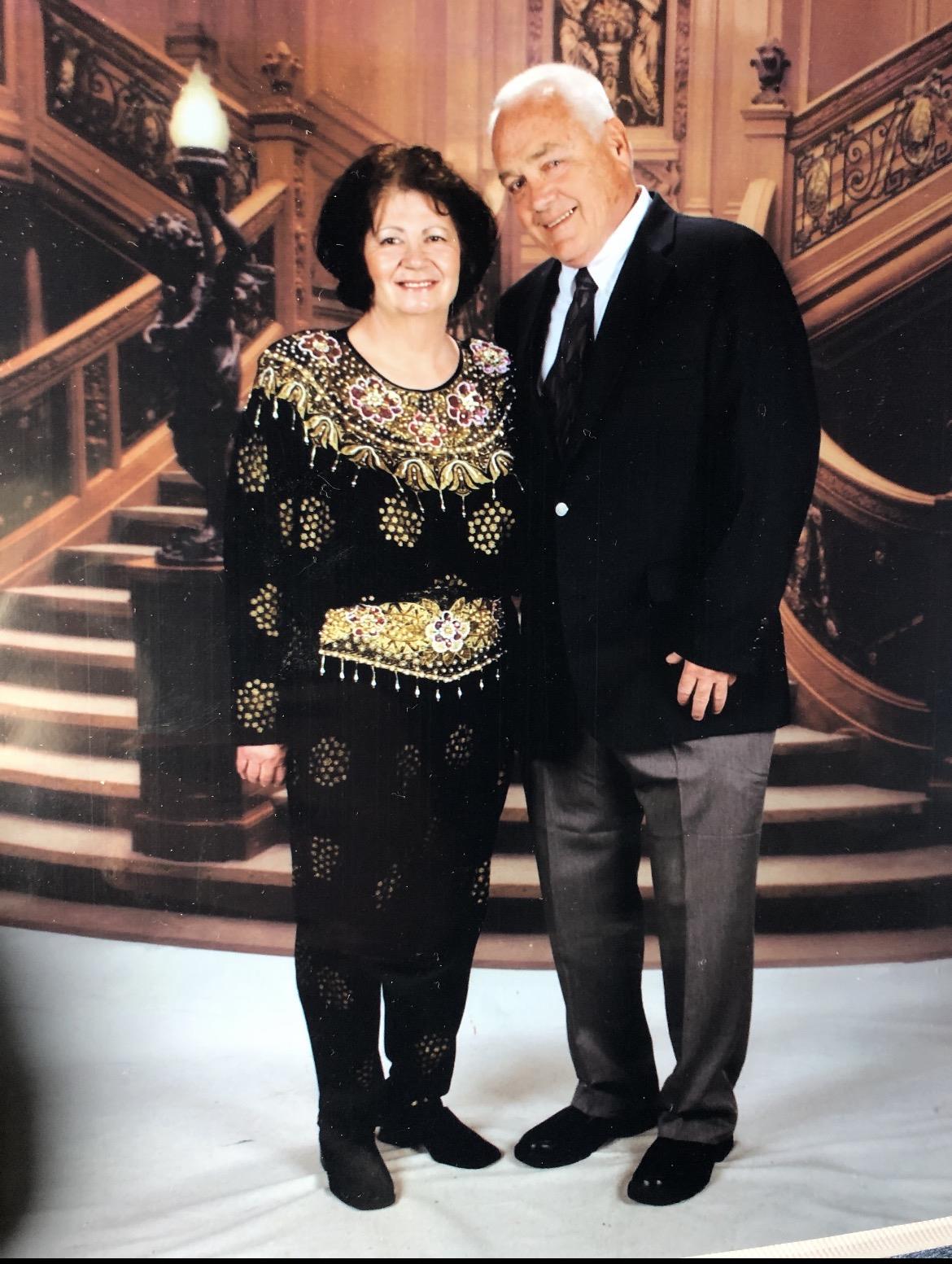 A man and woman posing for a picture
