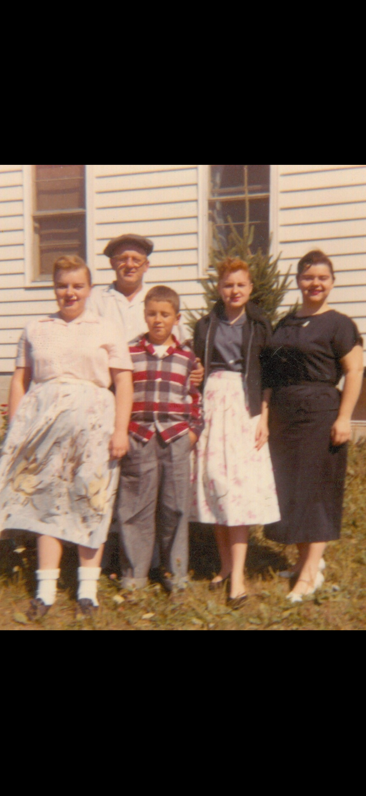 A group of people posing for a photo