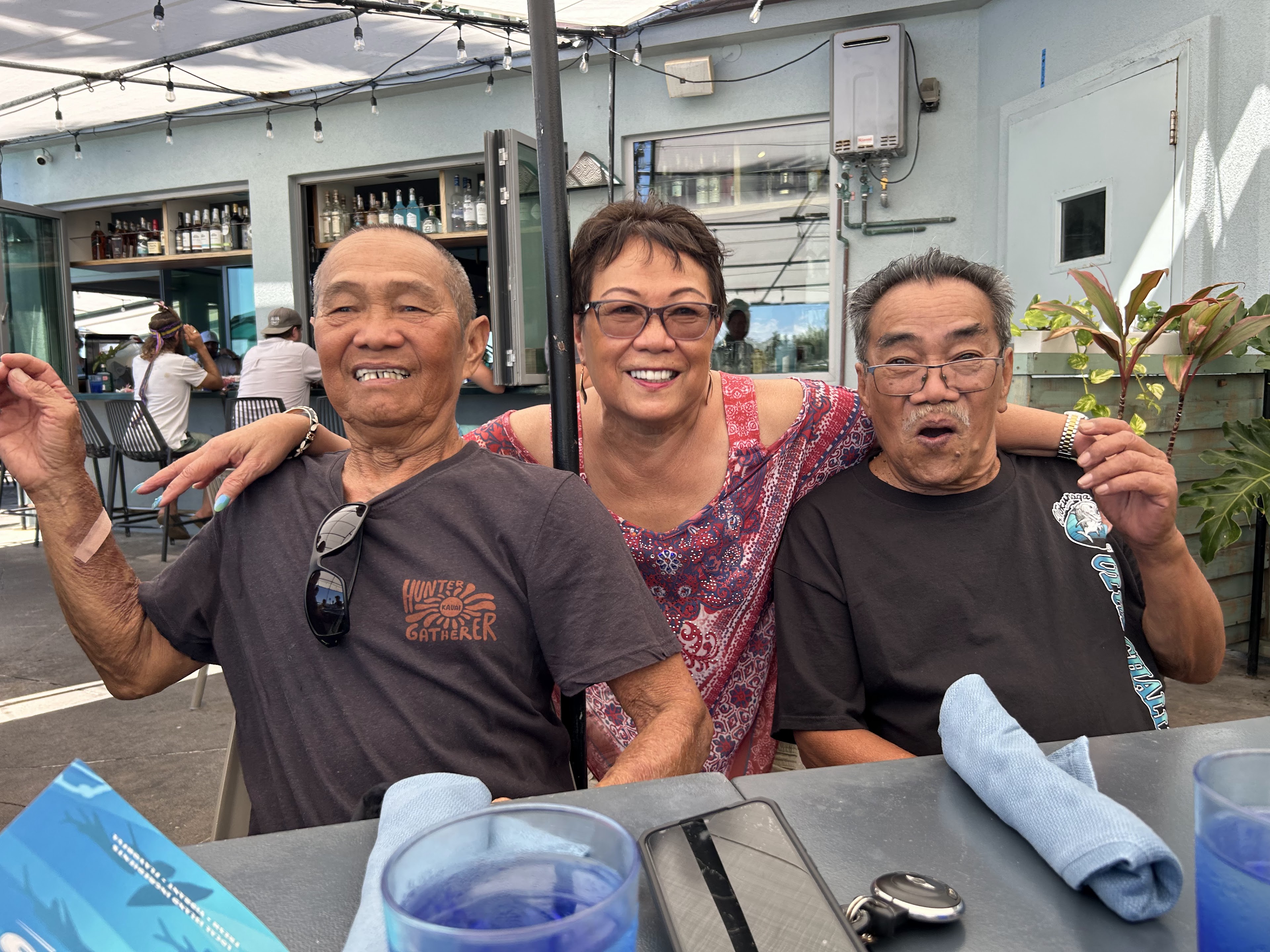 A group of people sitting at a table
