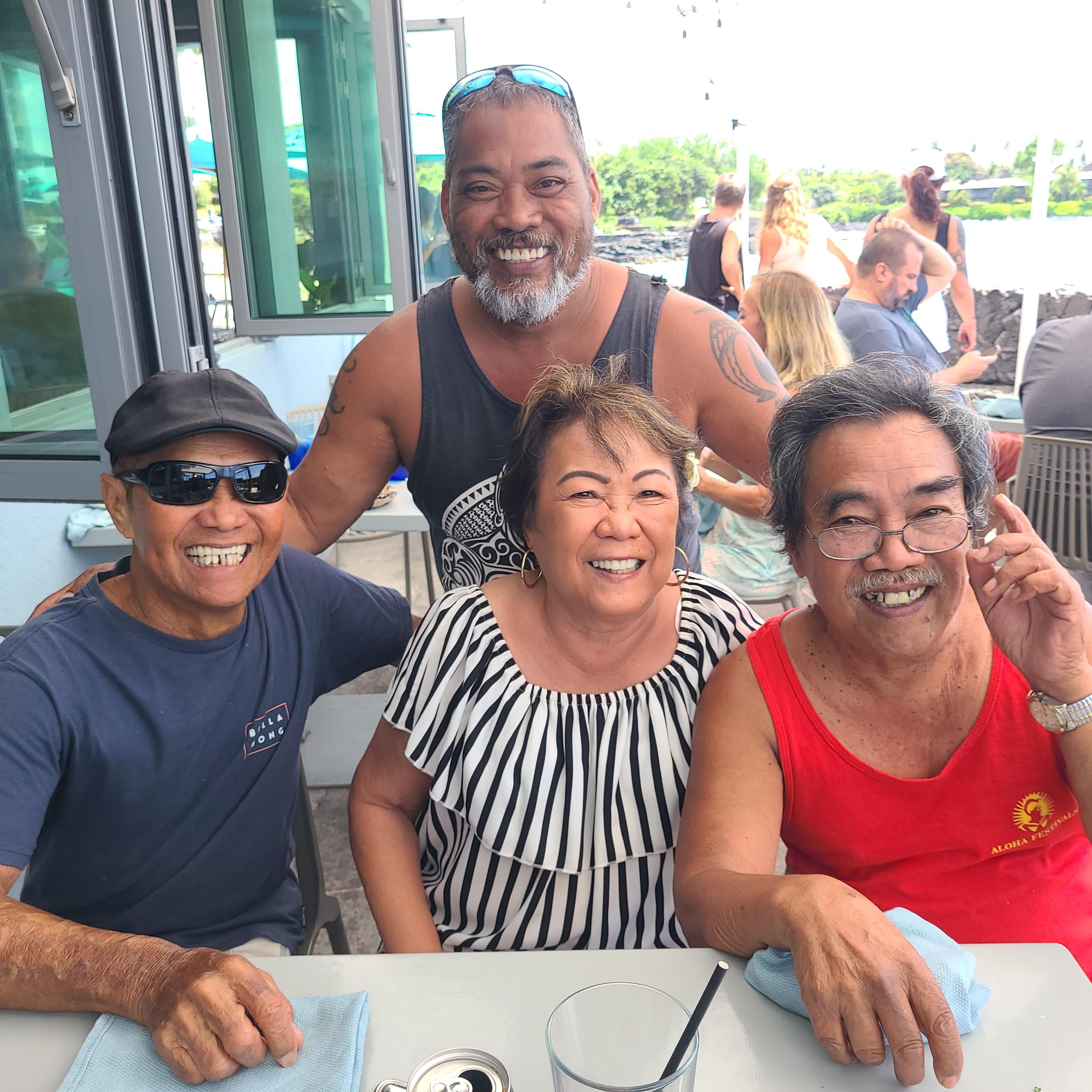 A group of people sitting at a table