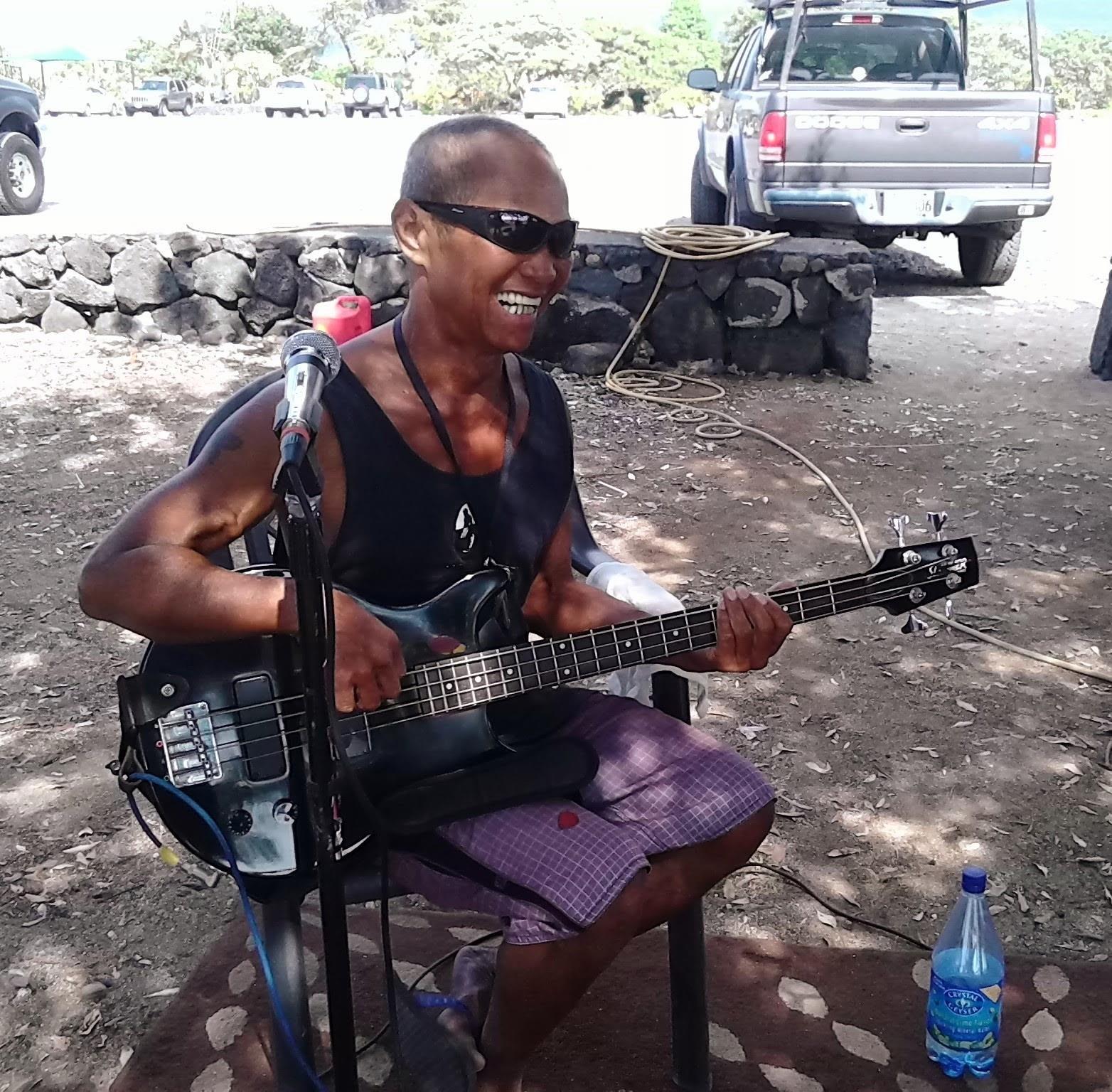 A man playing a guitar
