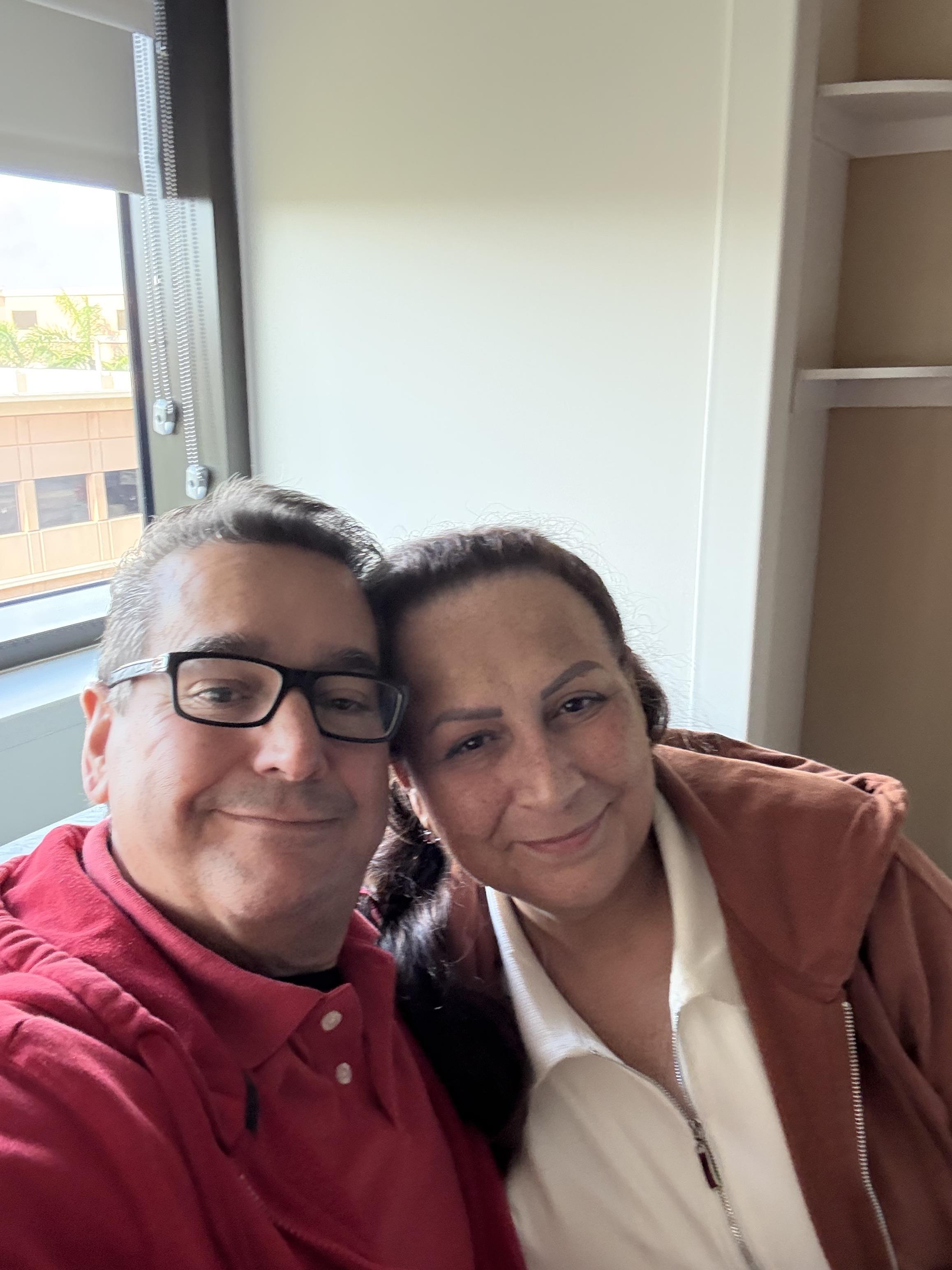 A man and woman taking a selfie