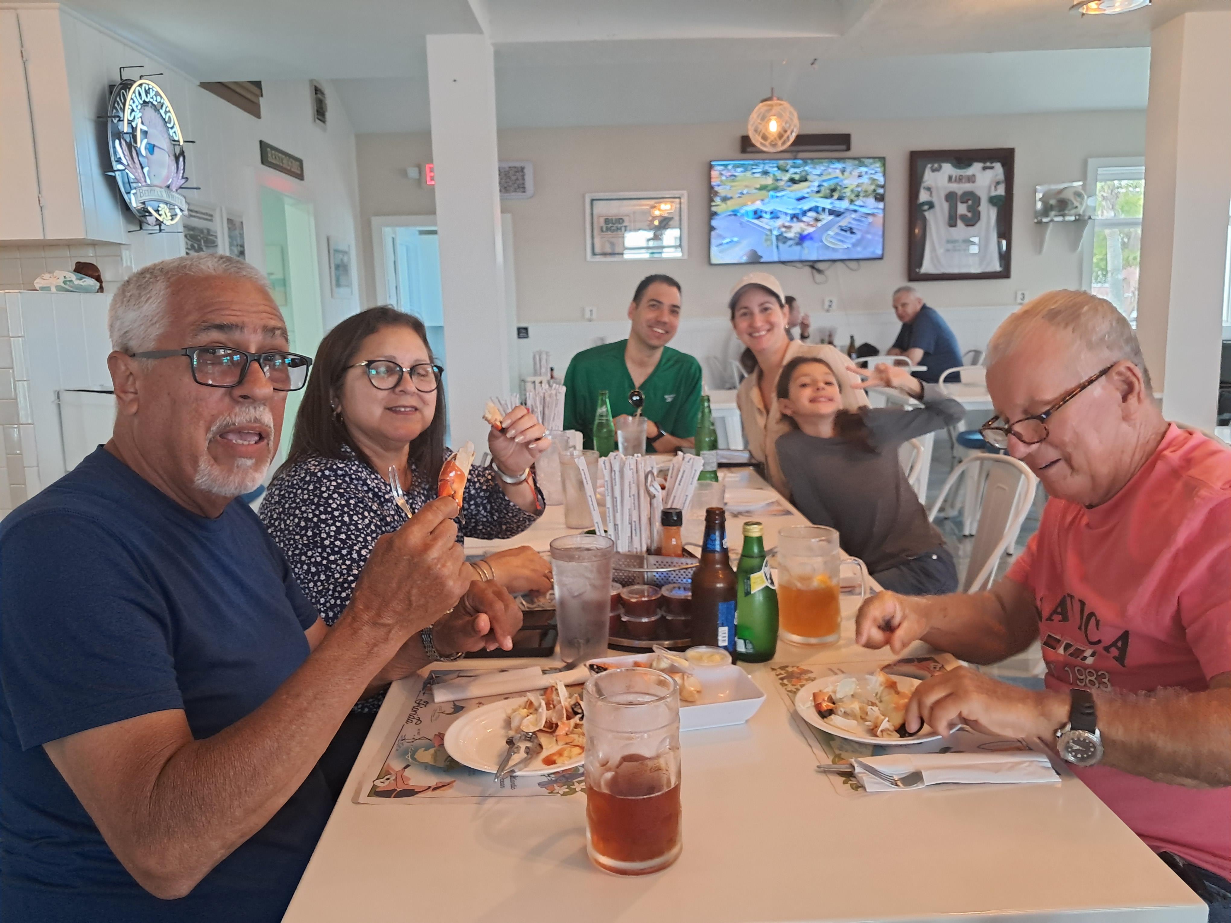 A group of people eating at a table
